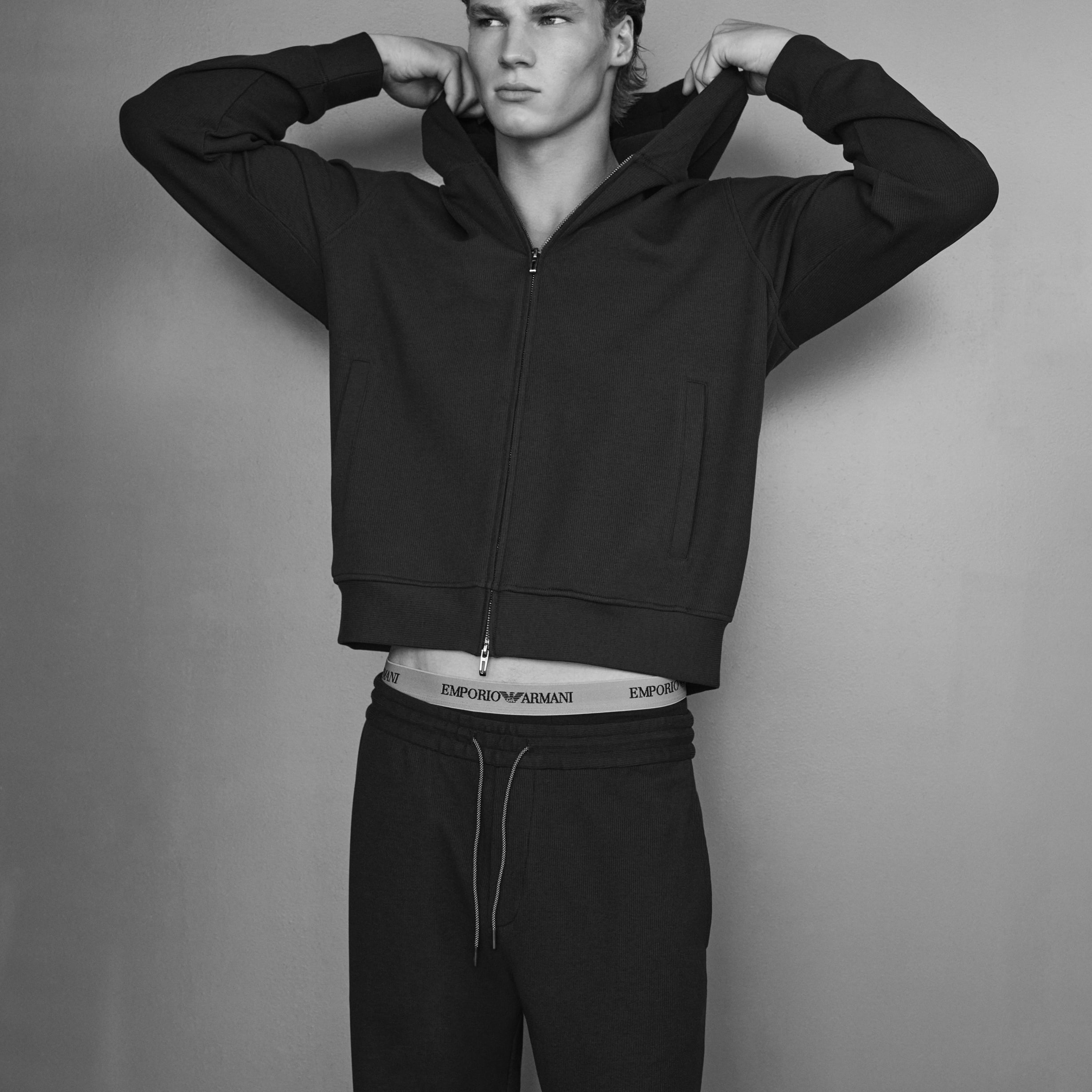 Man wearing clothing from Travel Essential collection