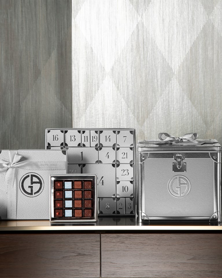 Video depicting different boxes of chocolates that seem to come to life and open up allowing chocolates to seemingly fly out into a colourful space