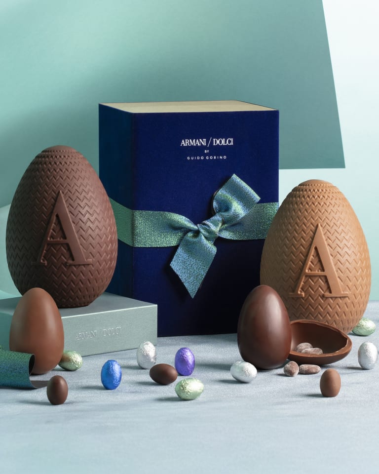 Video depicting different boxes of chocolates that seem to come to life and open up allowing chocolates to seemingly fly out into a colourful space