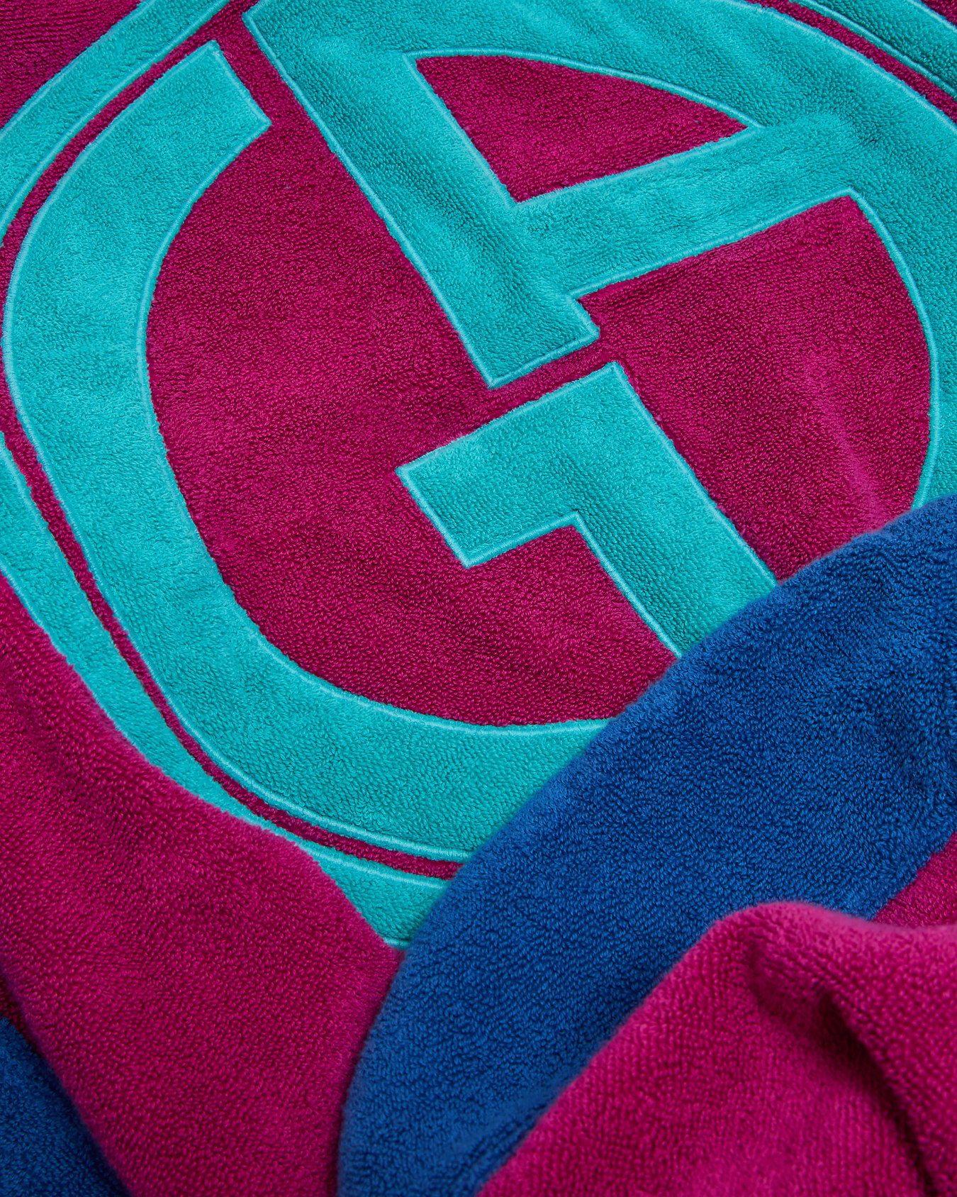 Telo mare bicolore con logo jacquard Slide 1