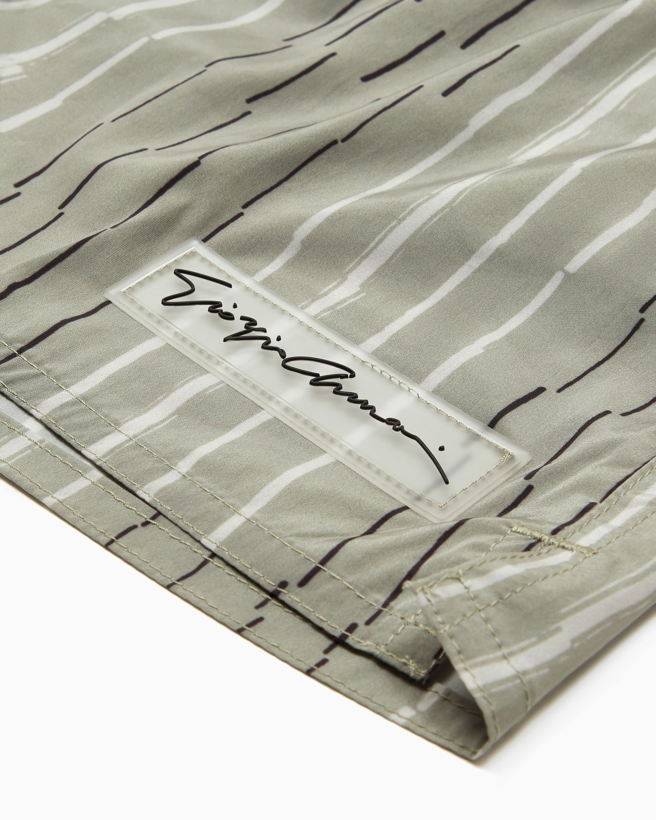 Irregular striped print swim trunks Slide 3