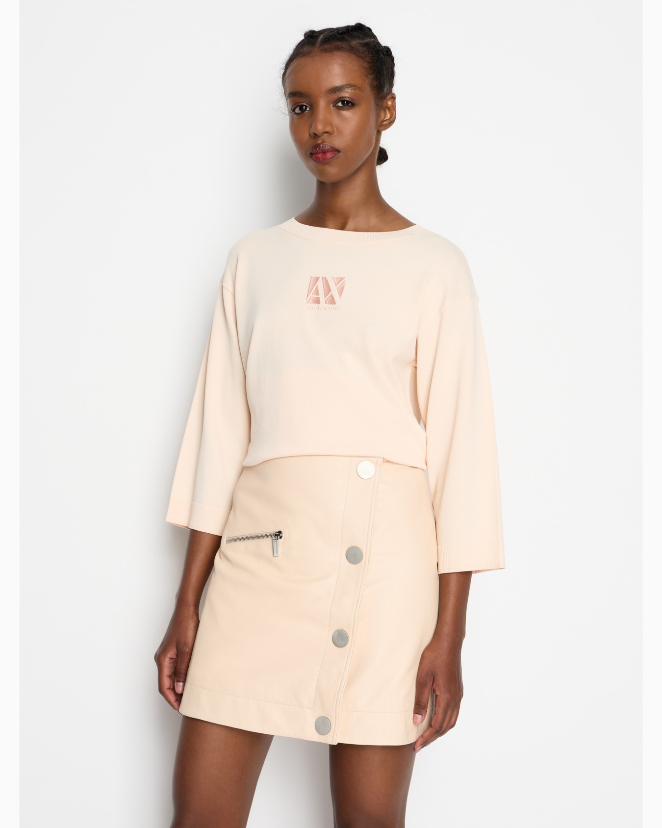 Leather miniskirt with diagonal buttoning Slide 1