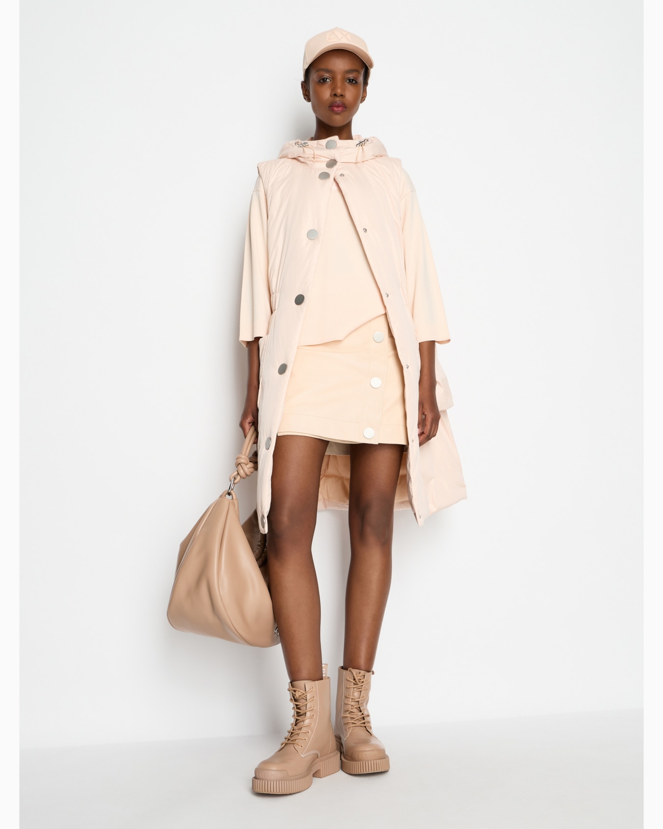 Leather miniskirt with diagonal buttoning Slide 3