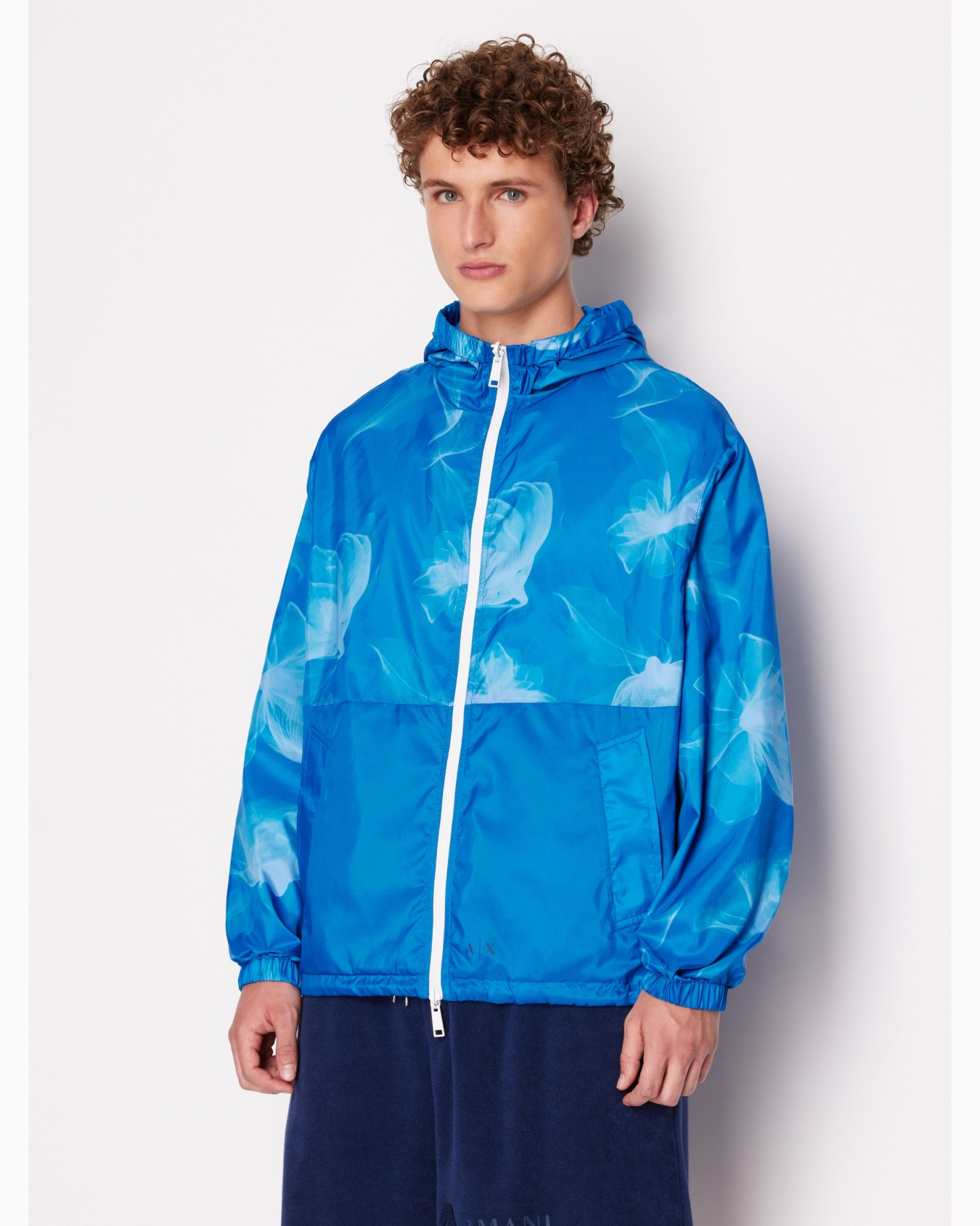 Non-woven windbreaker with hood and hook Diapositiva 1