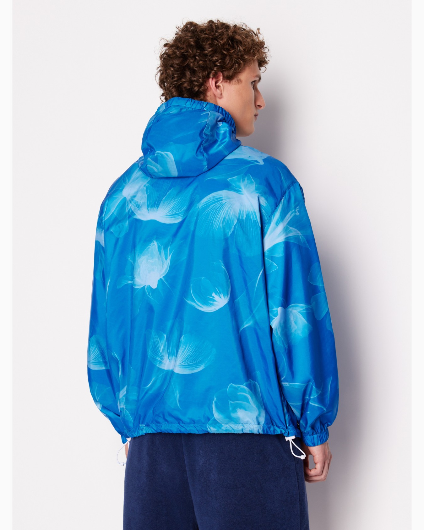 Non-woven windbreaker with hood and hook Diapositiva 2