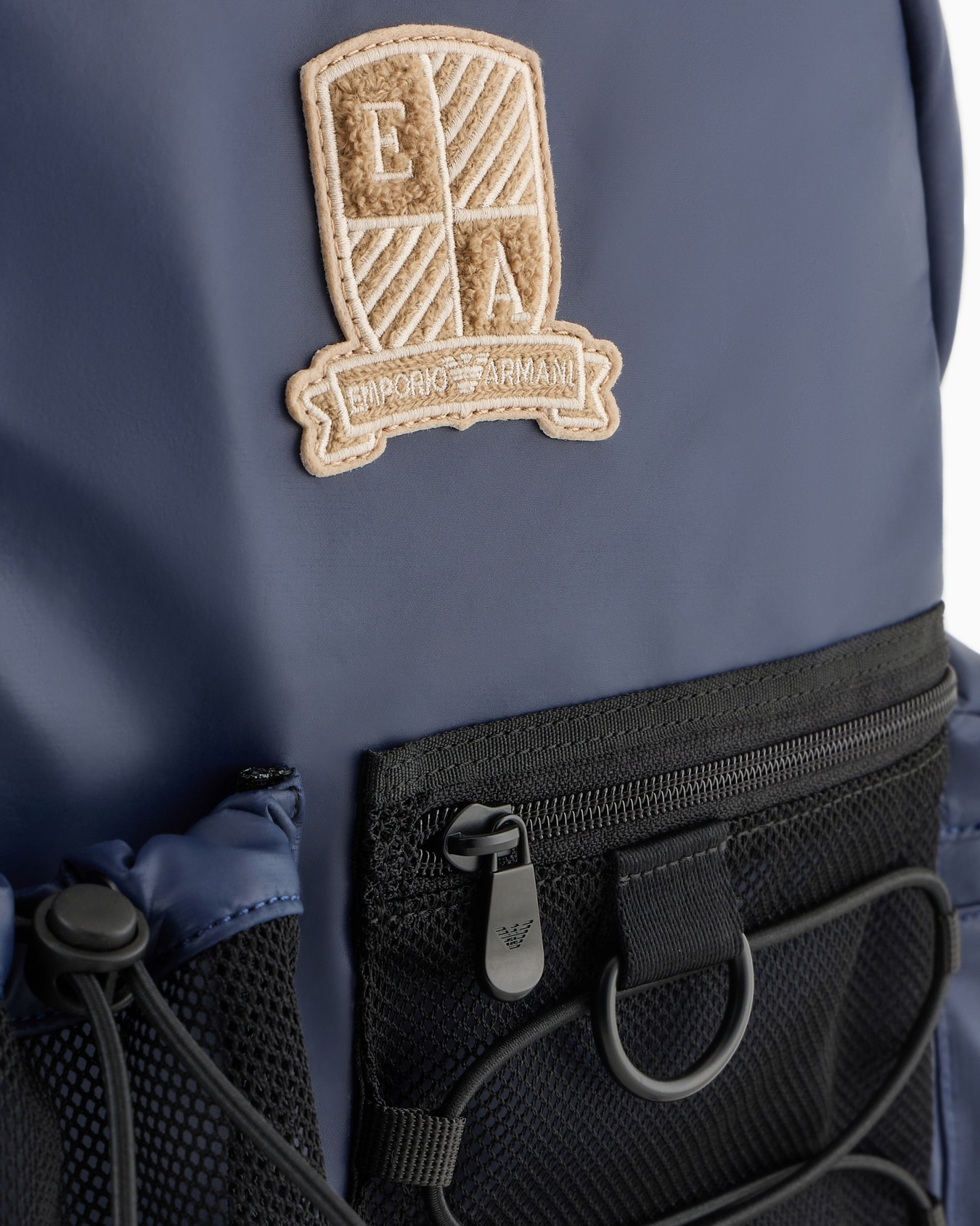 Multi-pocket backpack in coated fabric with logo crest patch Slide 4