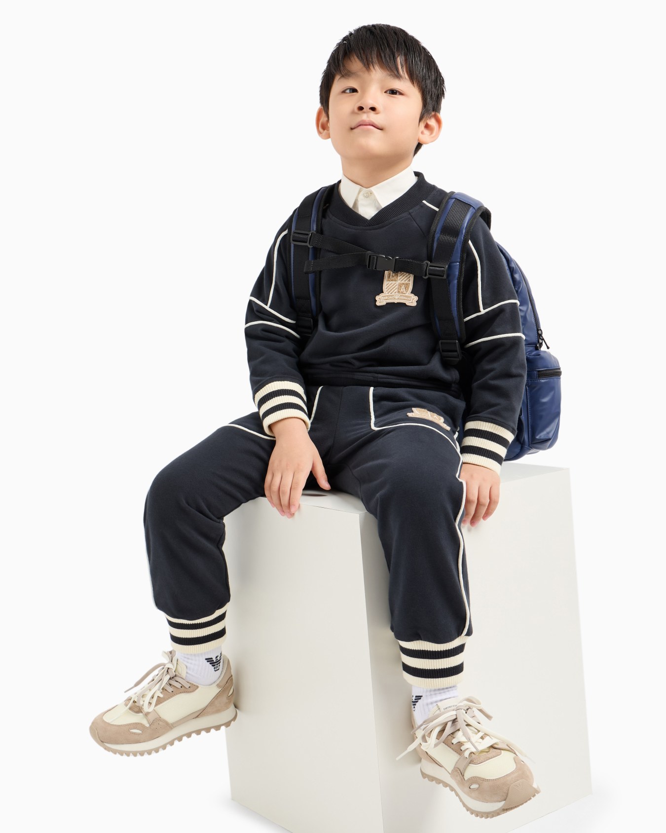 Multi-pocket backpack in coated fabric with logo crest patch Slide 5
