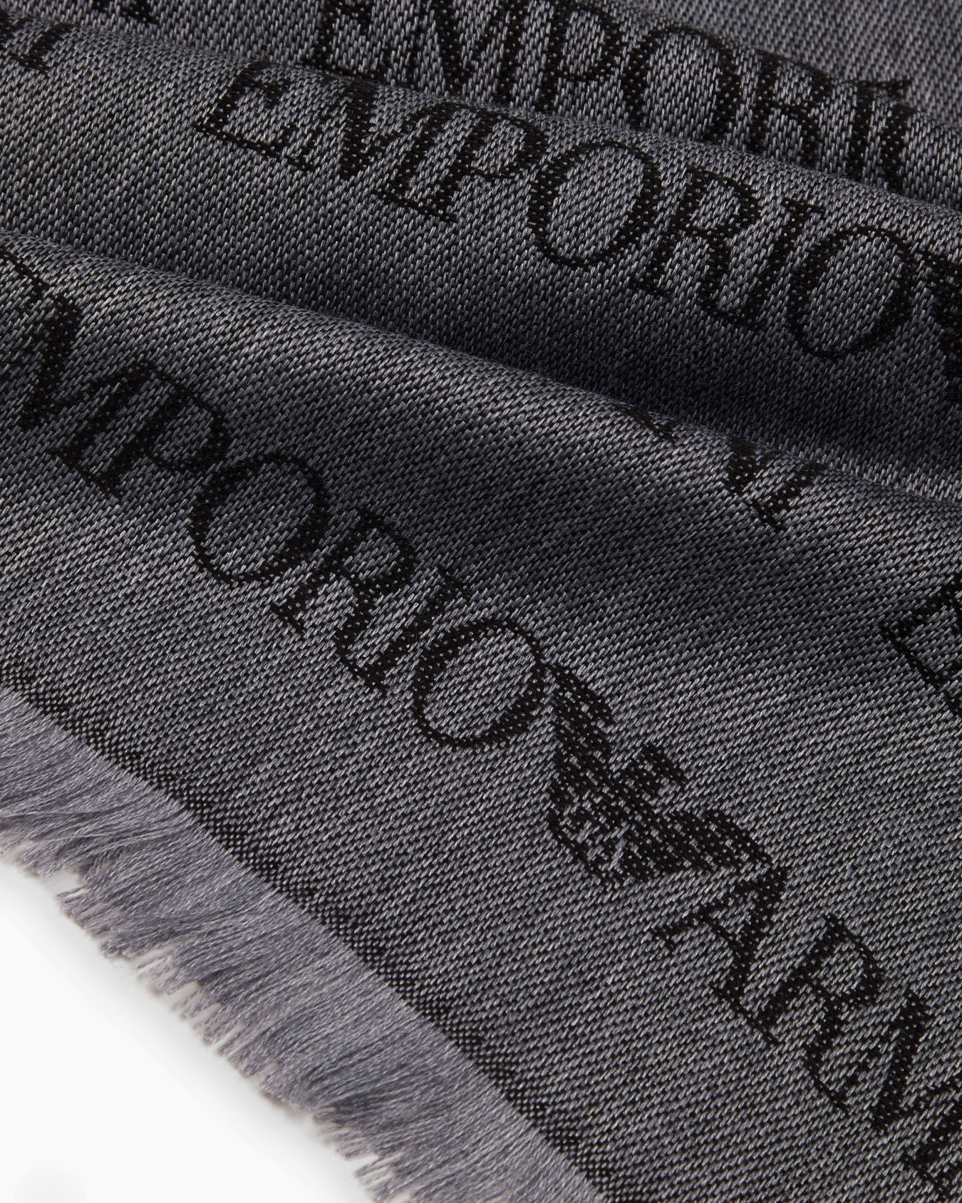 Virgin-wool blend scarf with jacquard logo lettering and fringes Slide 1