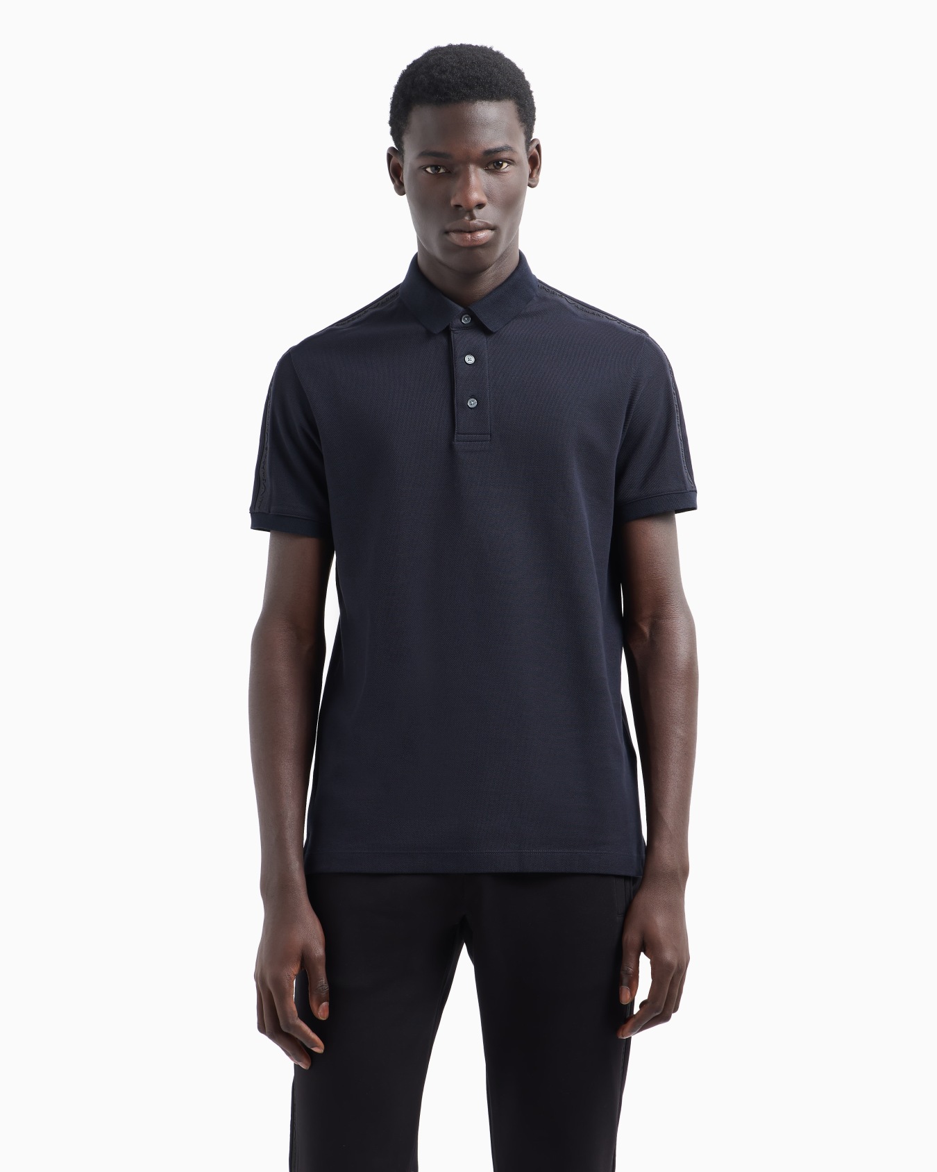 Polo en jersey avec bande logo en relief Diapositive 1