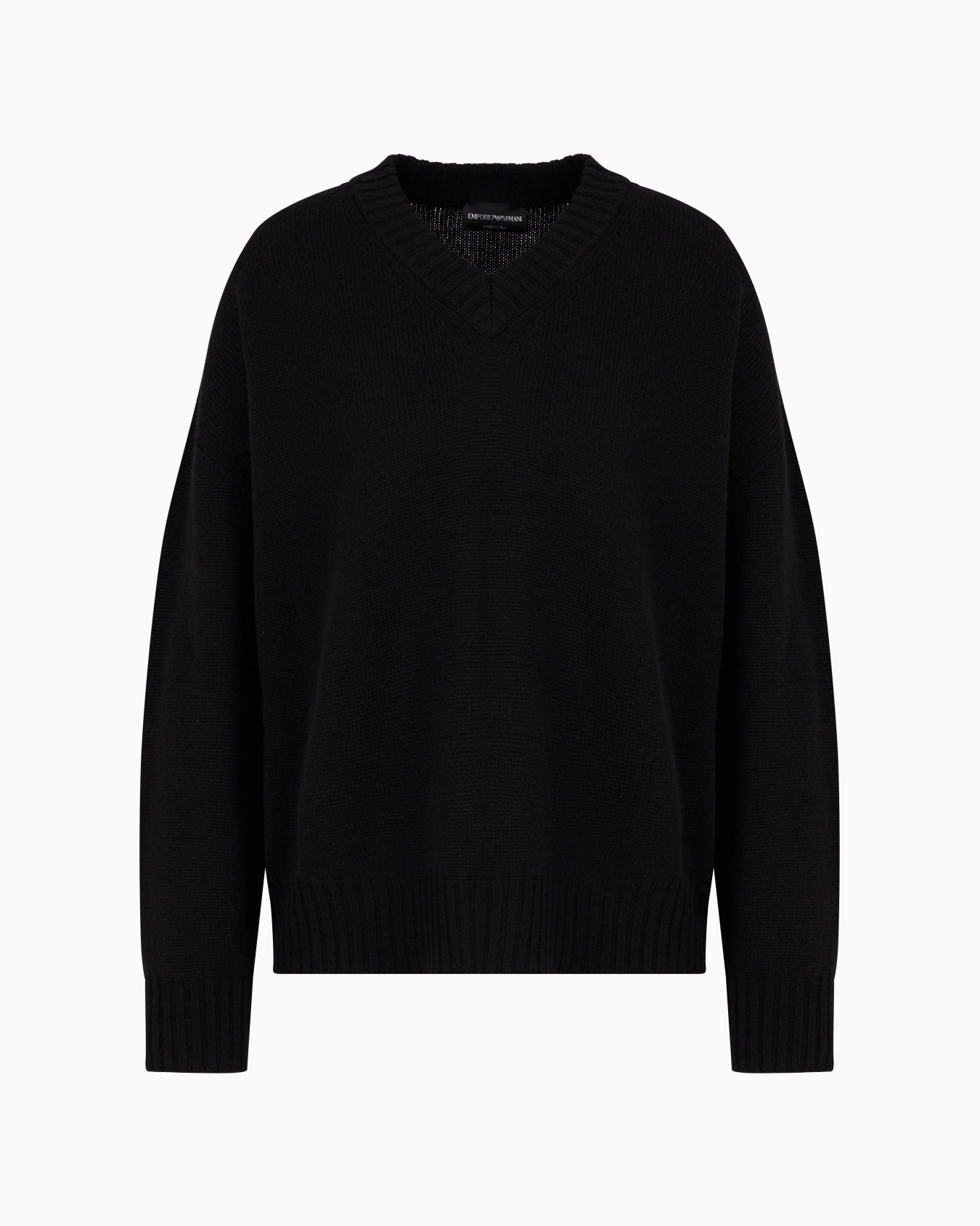Plain-knit, virgin-wool, seamless V-neck jumper Slide 0