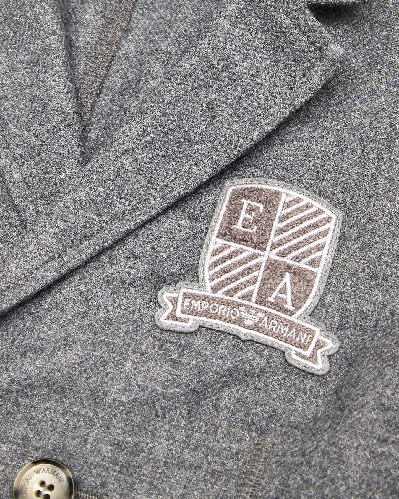 Wool-blend double-breasted jacket with logo crest patch Slide 1