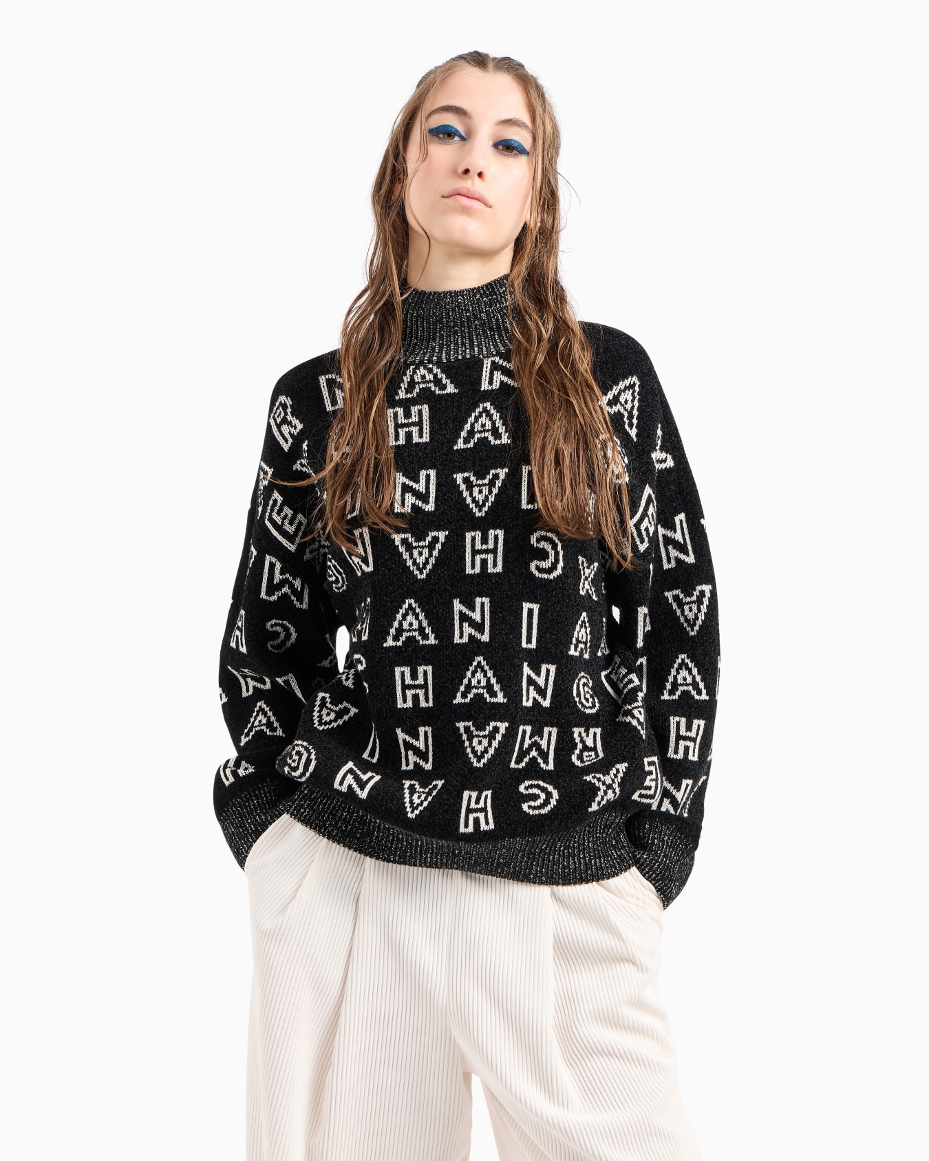 Knit turtleneck sweater with allover jacquard logo Slide 1