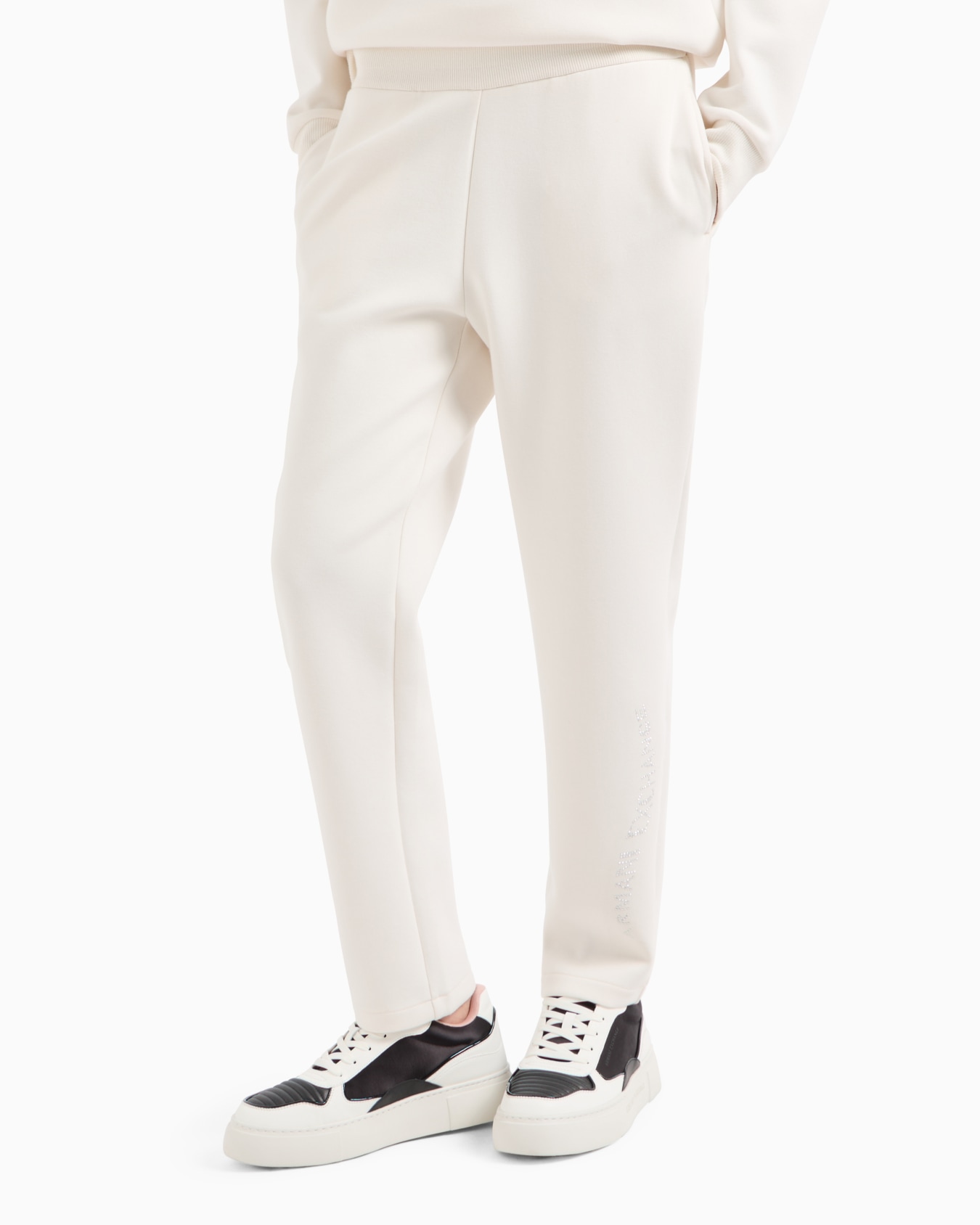 Pantalón jogger de tejido elástico con logo de strass Diapositiva 1