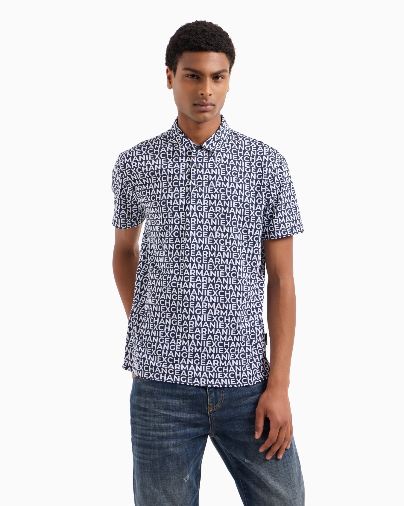 Regular fit cotton polo with allover logo Slide 1