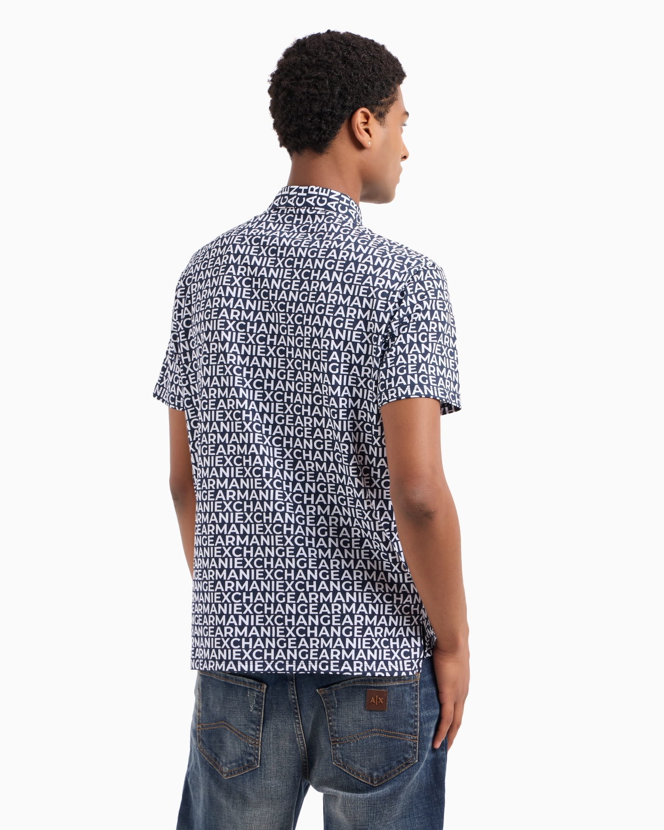 Regular fit cotton polo with allover logo Slide 2