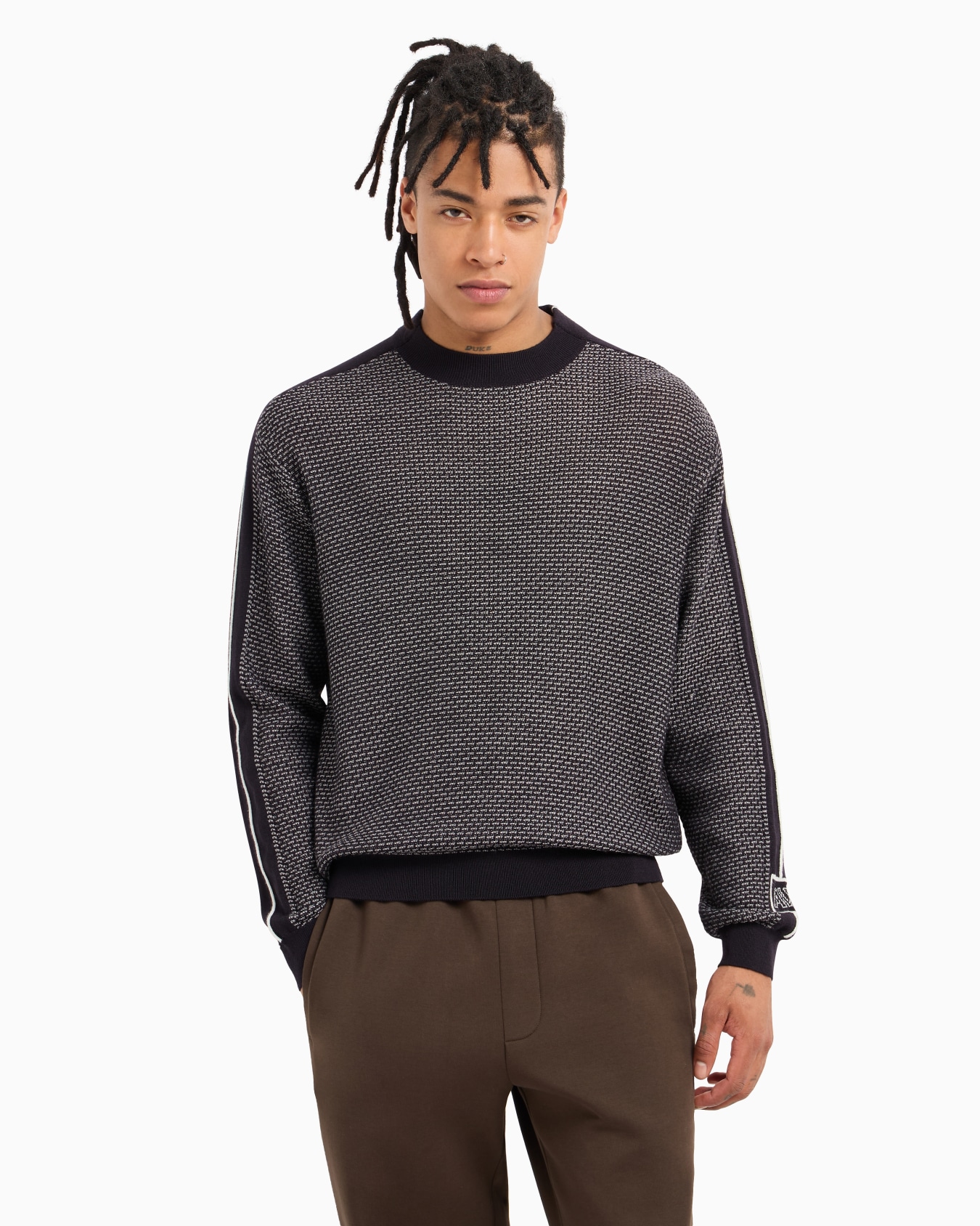 Crewneck sweater in wool blend with bands on the sleeves Slide 1