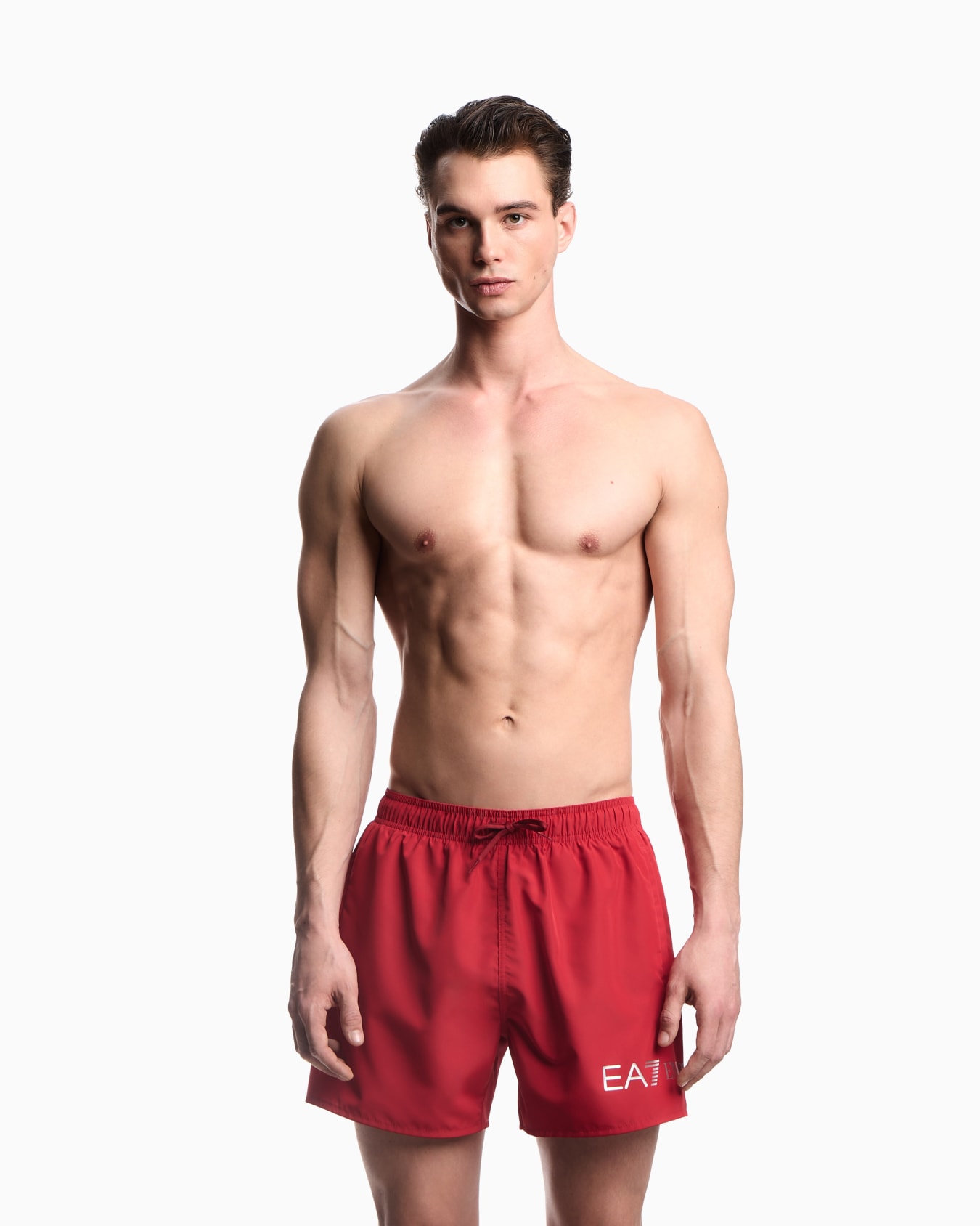 Swim trunks with logo Slide 1
