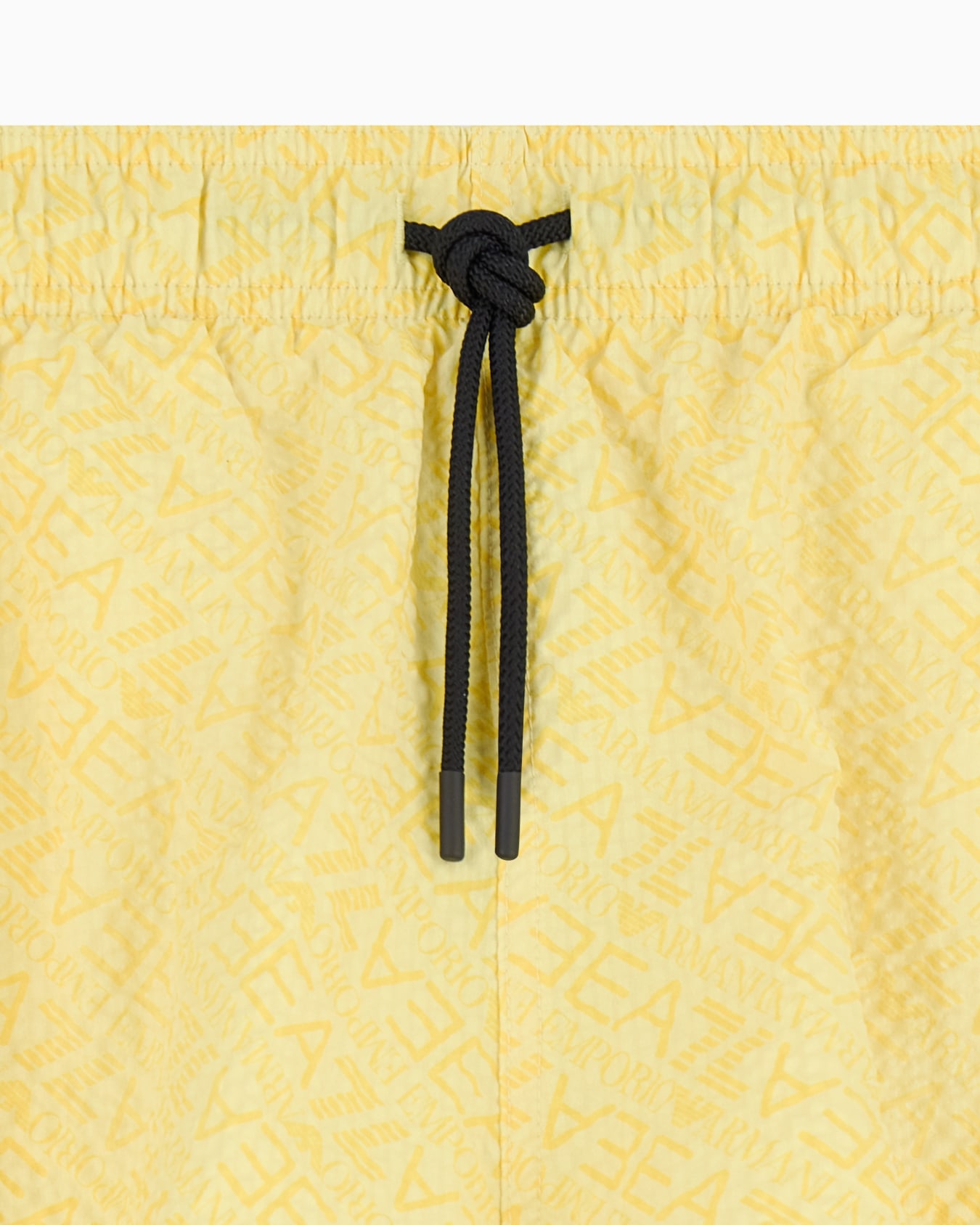 Graphic Series swim trunks with monogram print Slide 1