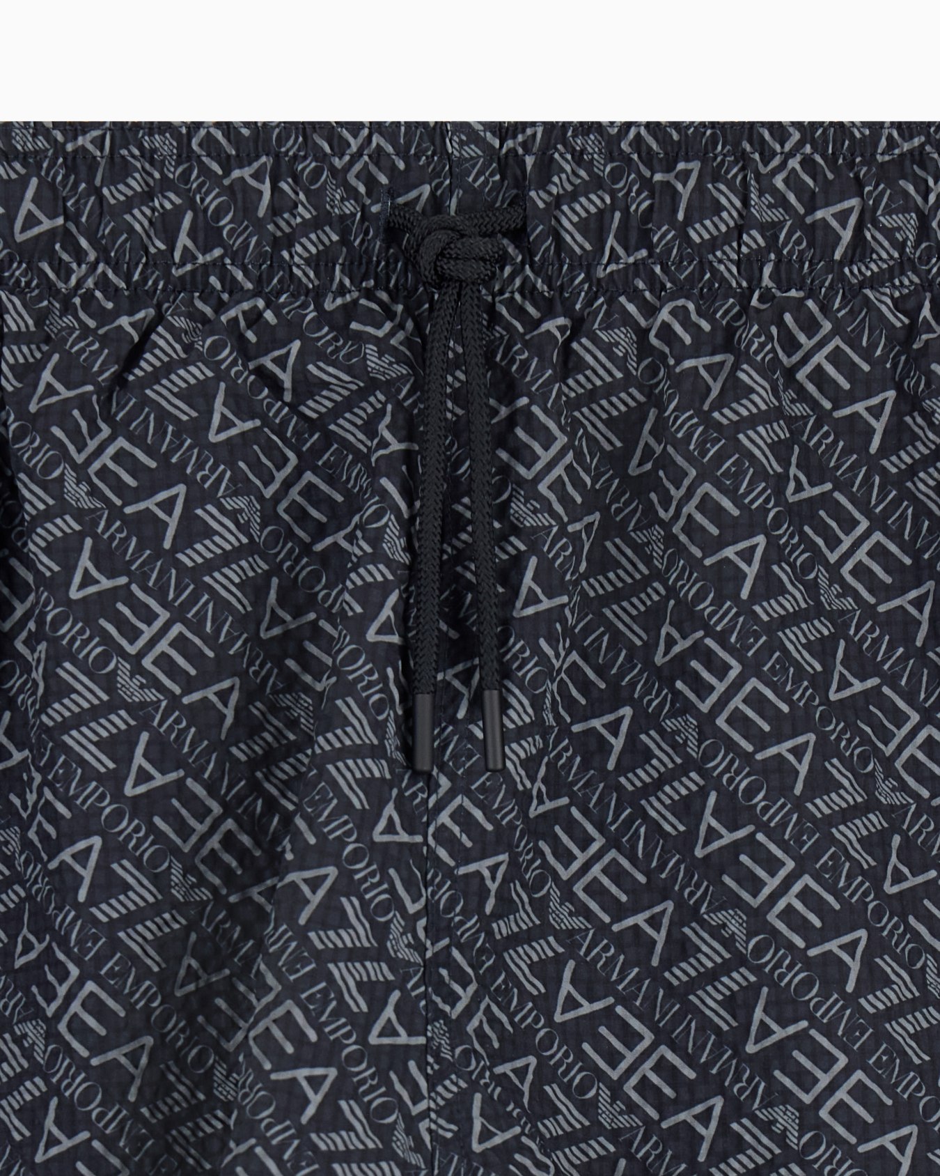 Graphic Series swim trunks with monogram print Slide 1