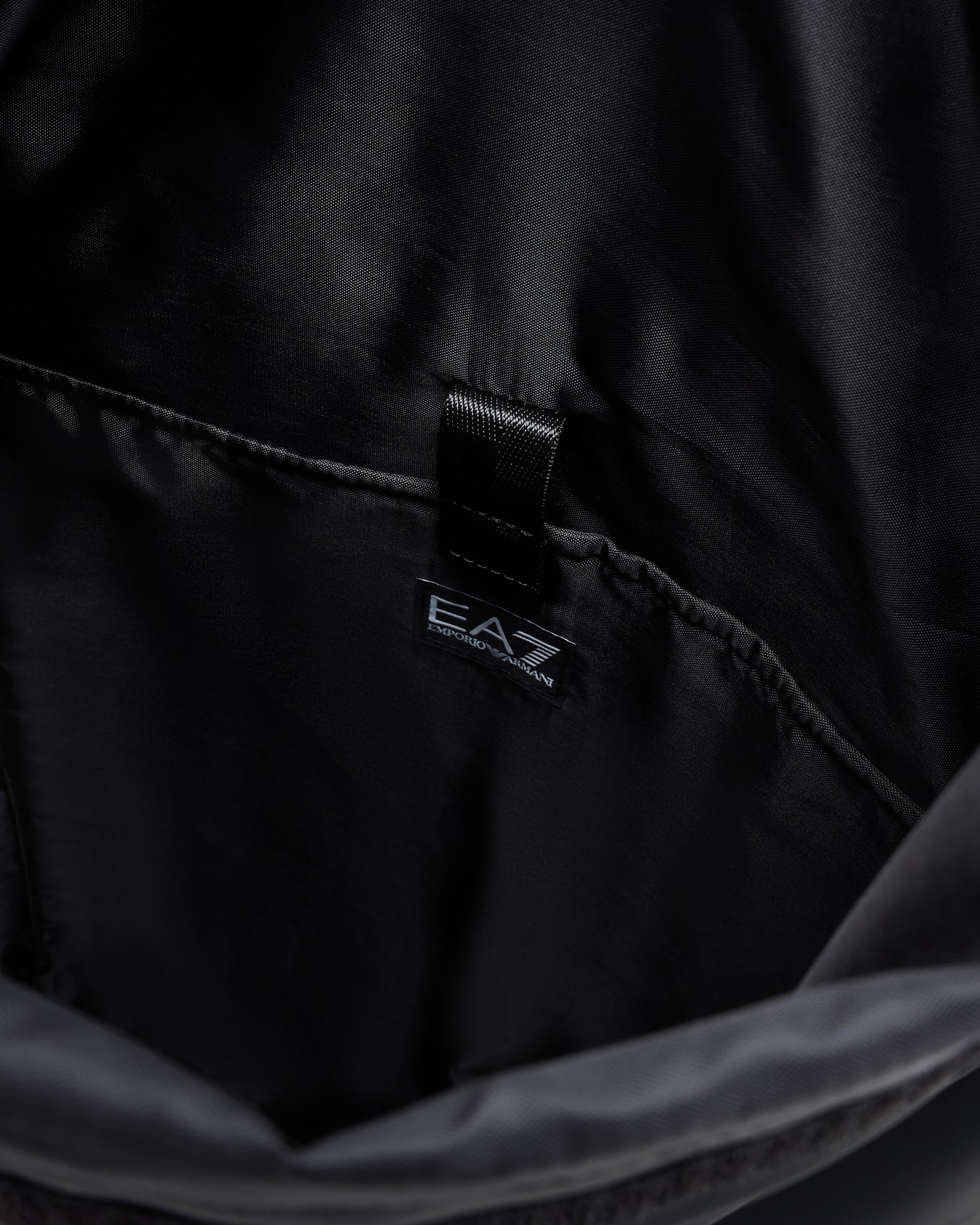 Backpack in rubberised fabric Slide 3