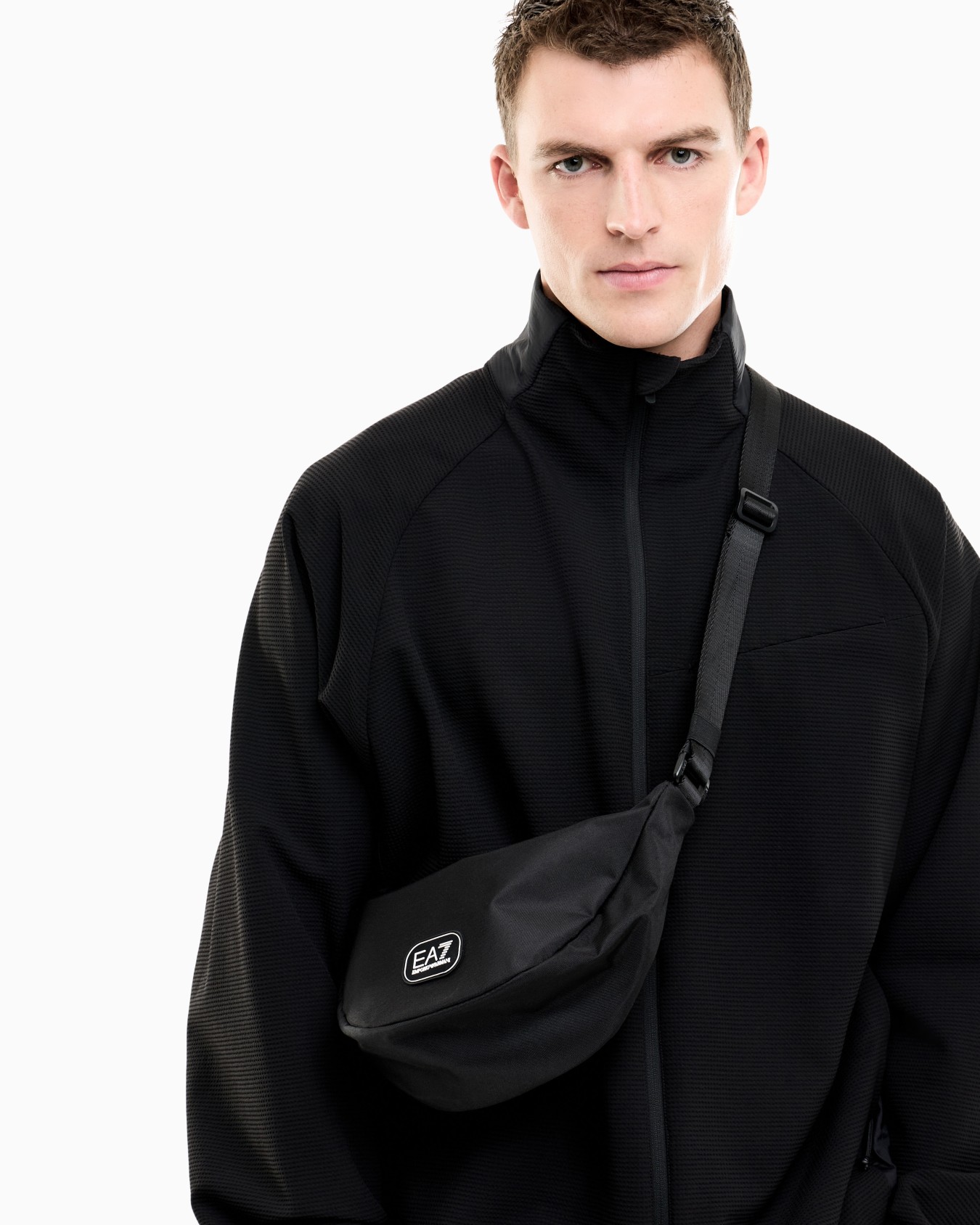 Sling bag in coated fabric Slide 5