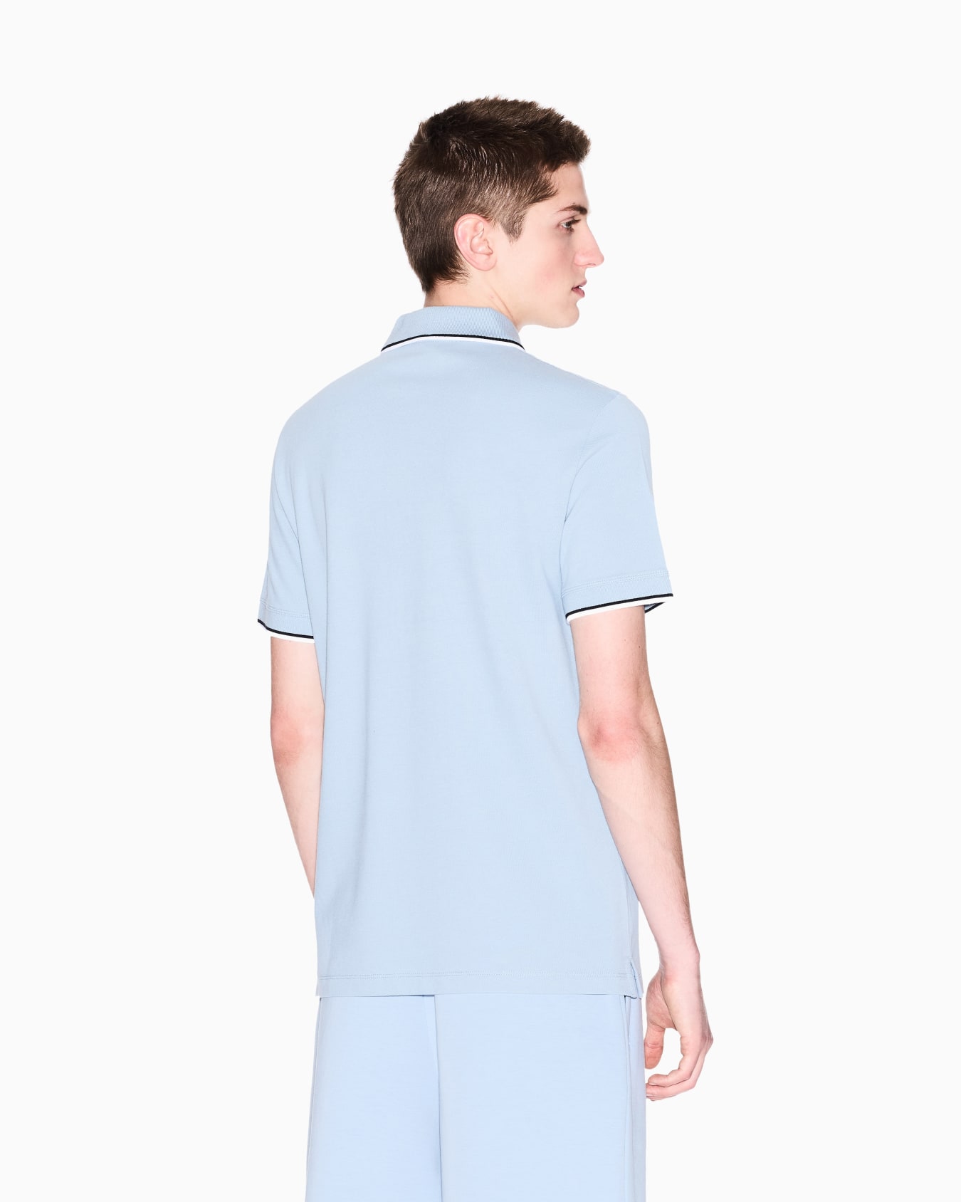 Piquet polo with contrasting details Slide 2