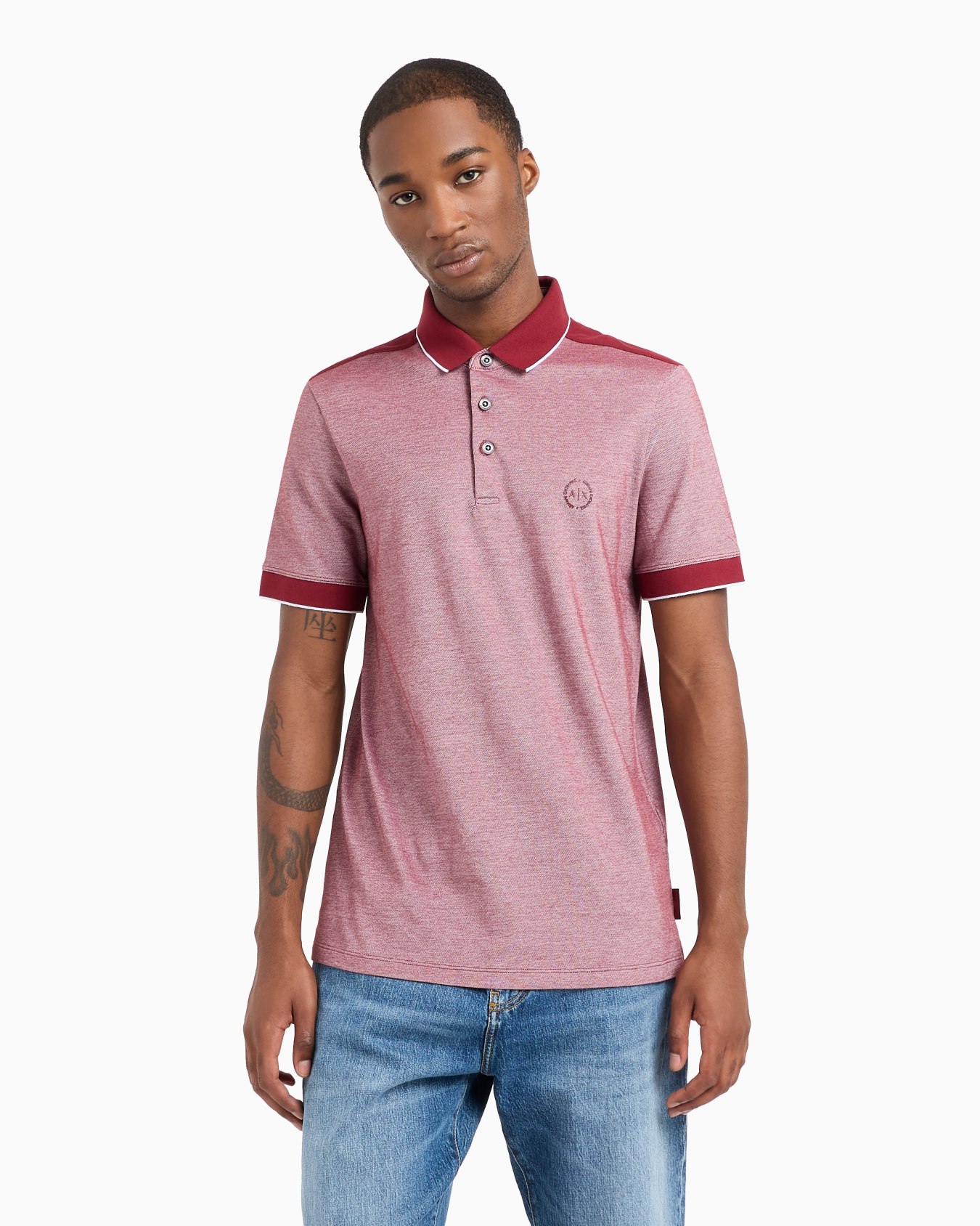 Polo de algodón con detalles en contraste Diapositiva 1