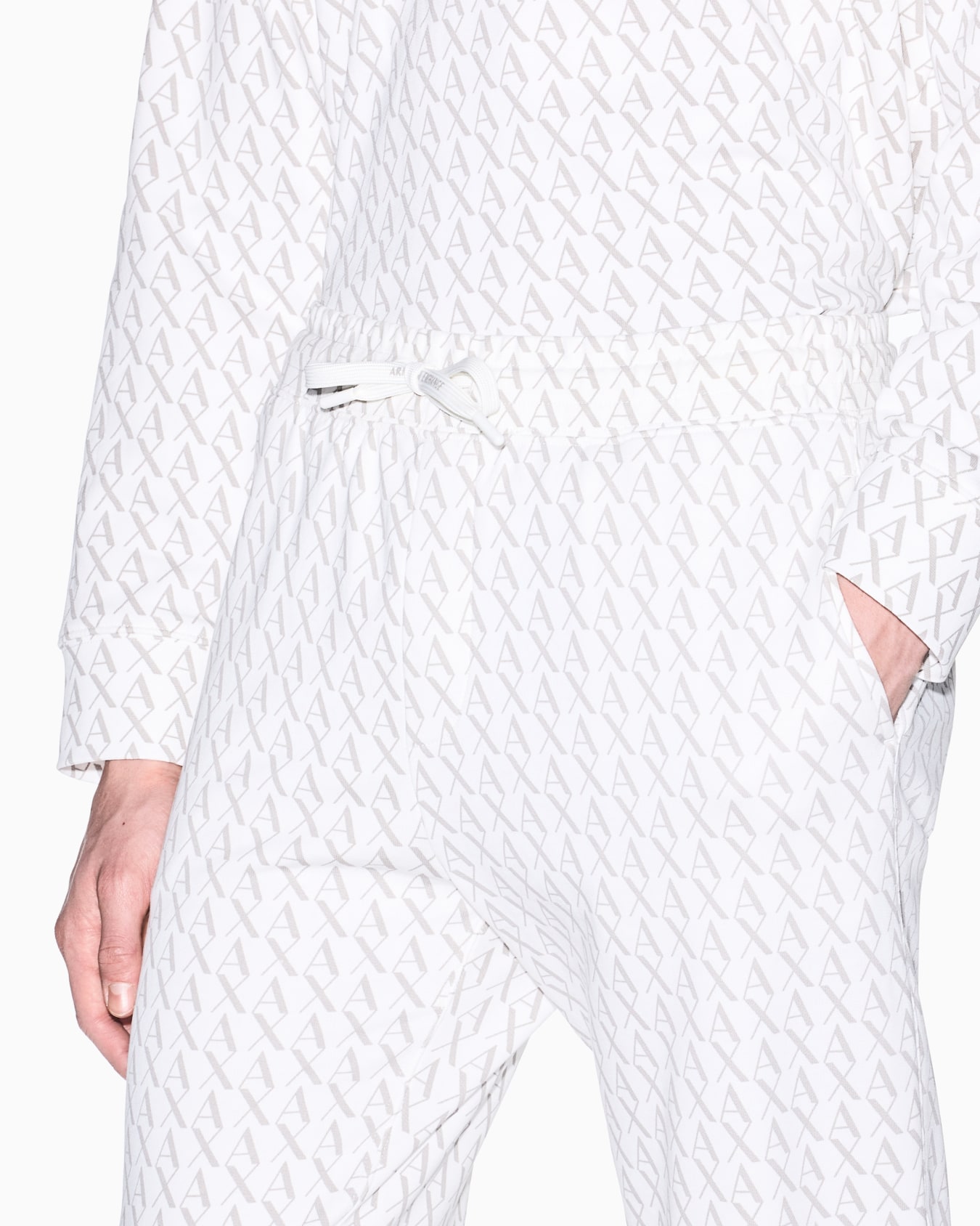 Jogger pants in fabric with allover logo pattern Slide 4