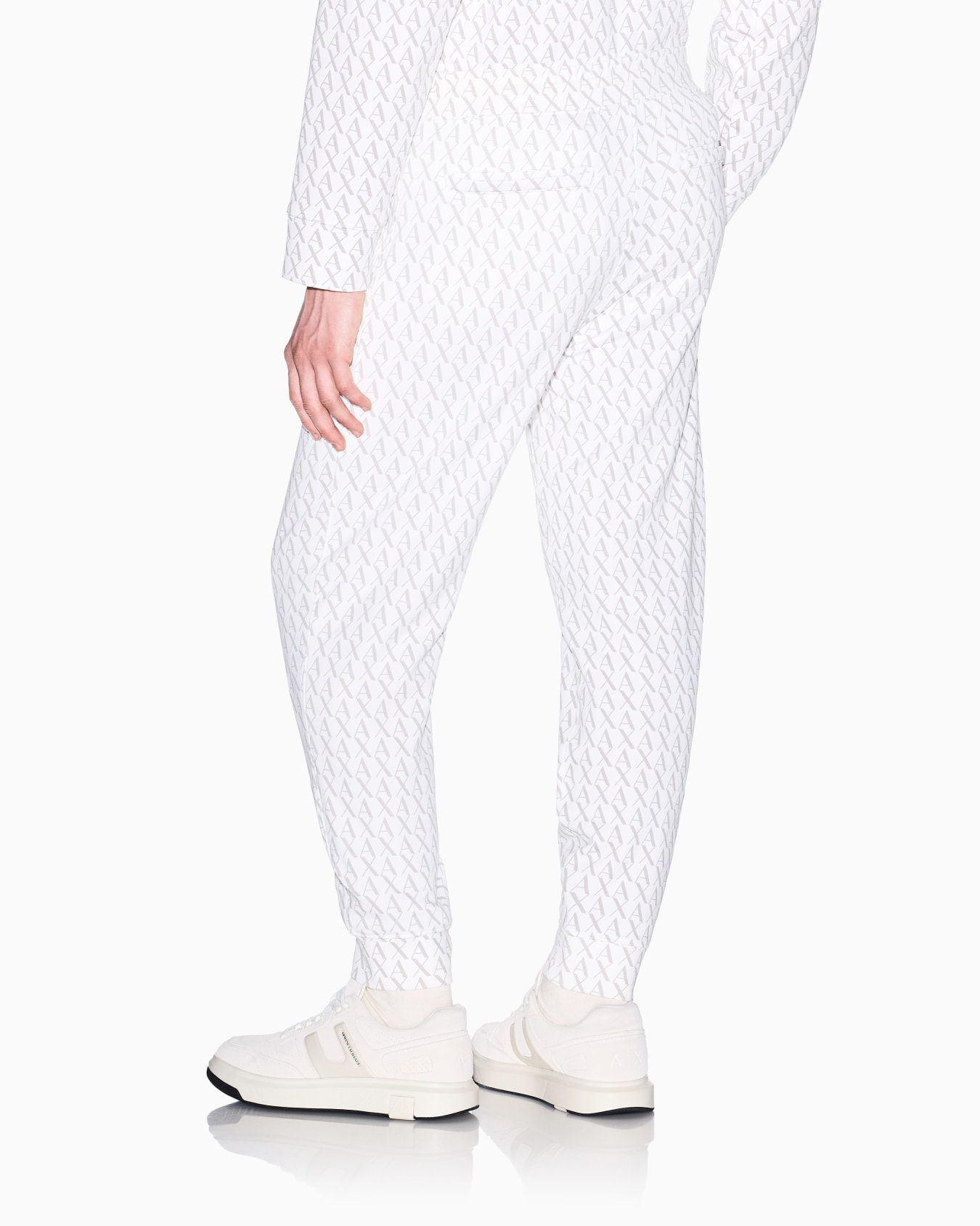Jogger pants in fabric with allover logo pattern Slide 2