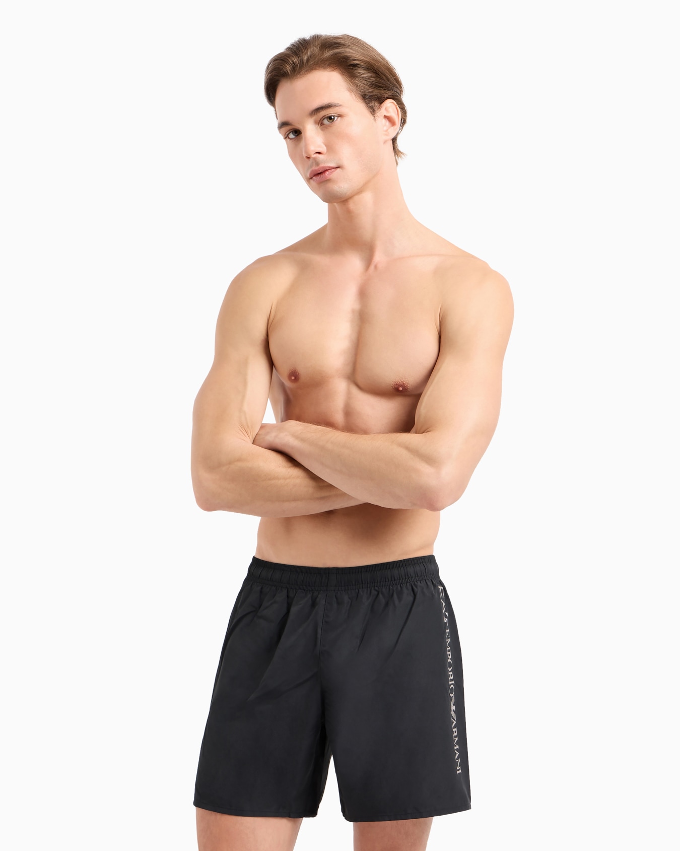 Swim trunks with logo Slide 1