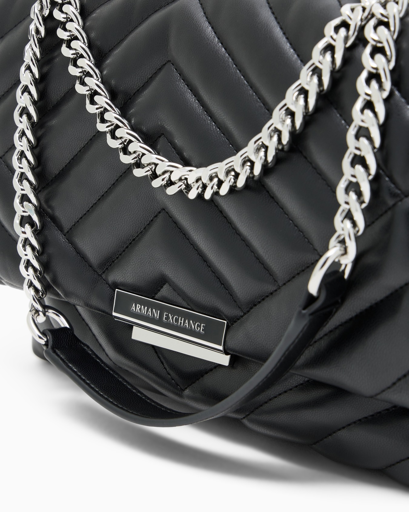 Shoulder bag in quilted material with metal details Slide 4