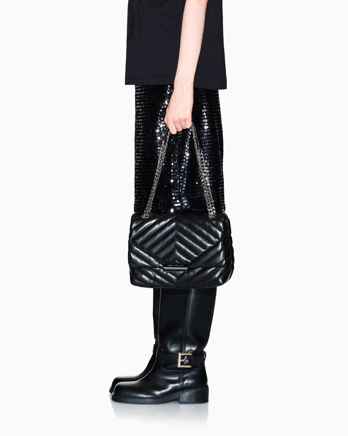 Shoulder bag in quilted material with metal details Slide 5