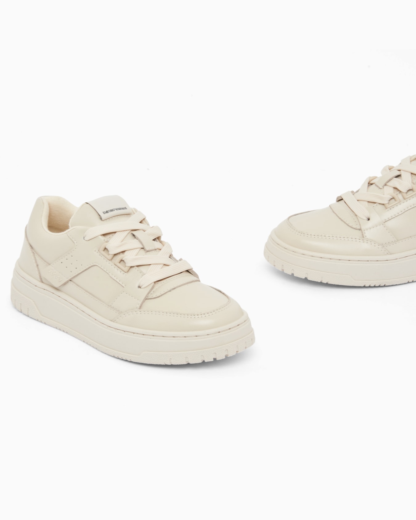 Shiny leather low-top sneakers with a textured rubber sole Slide 4