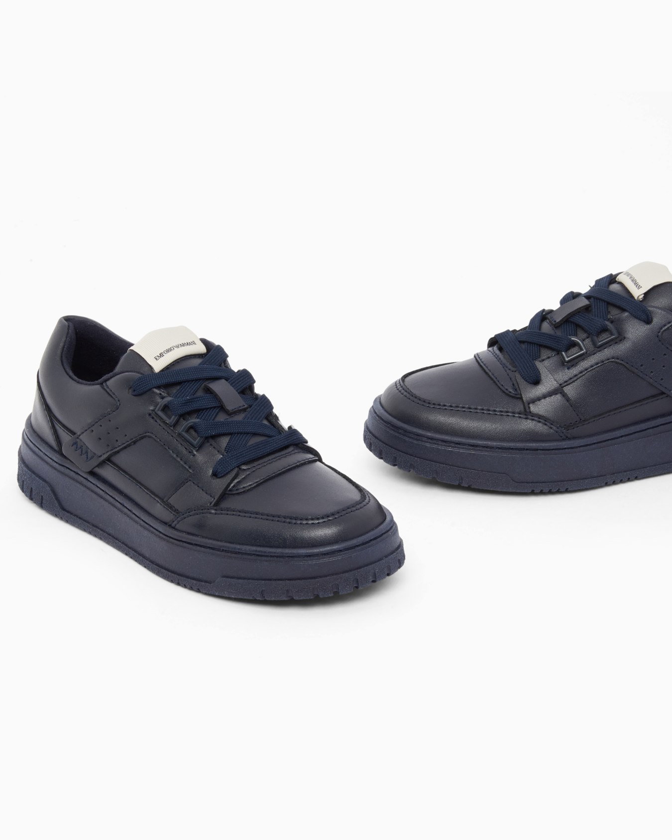 Shiny leather low-top sneakers with a textured rubber sole Slide 4