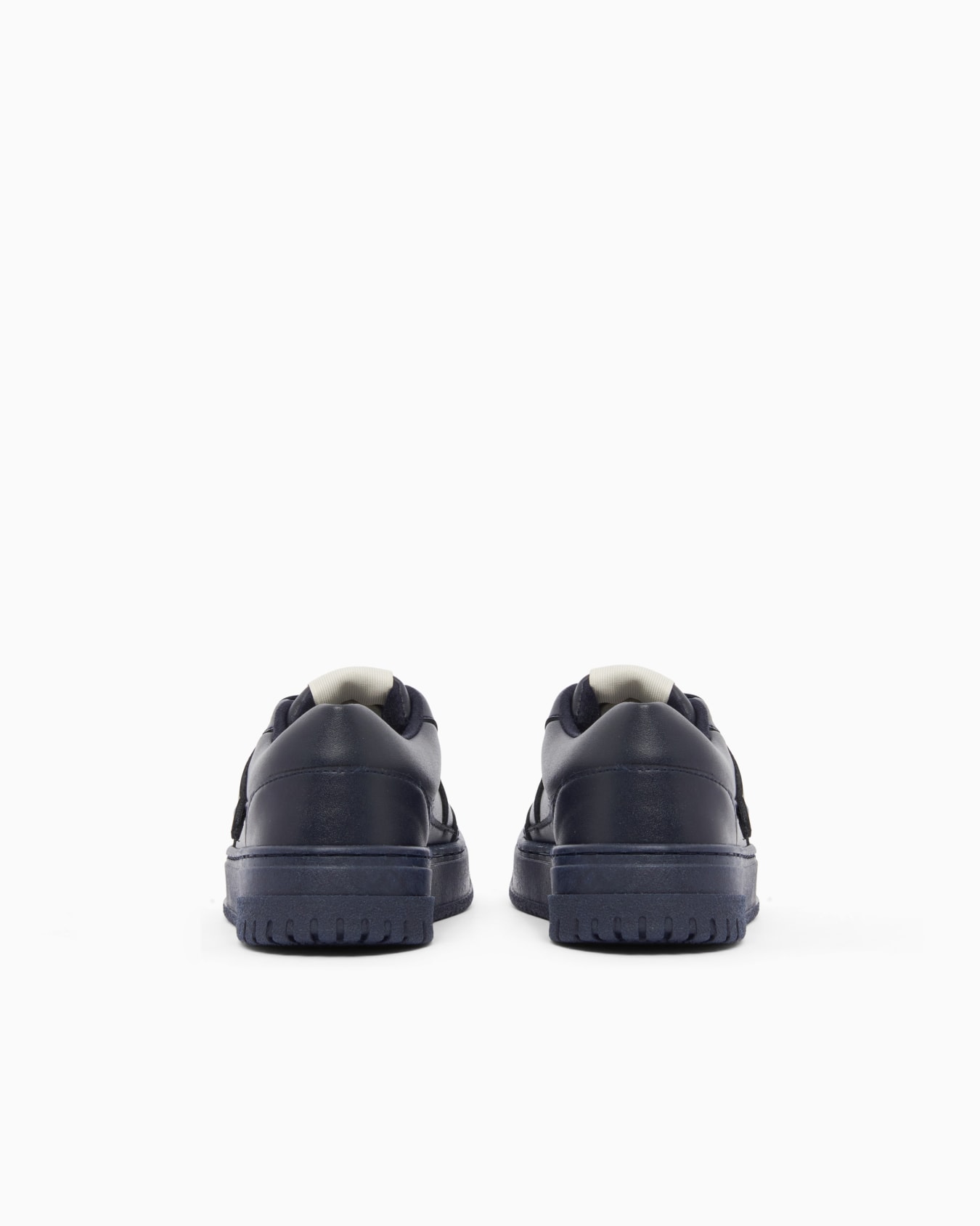 Shiny leather low-top sneakers with a textured rubber sole Slide 3