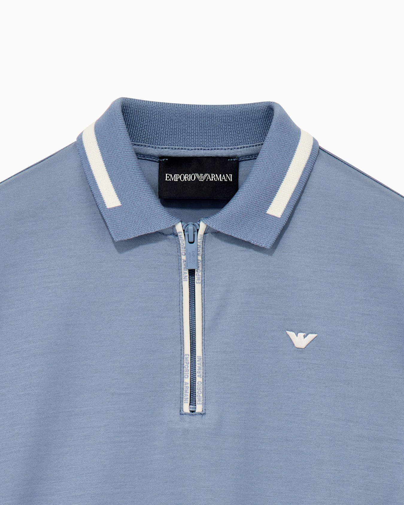 Polo shirt in jersey with a zip closure and striped collar Slide 1