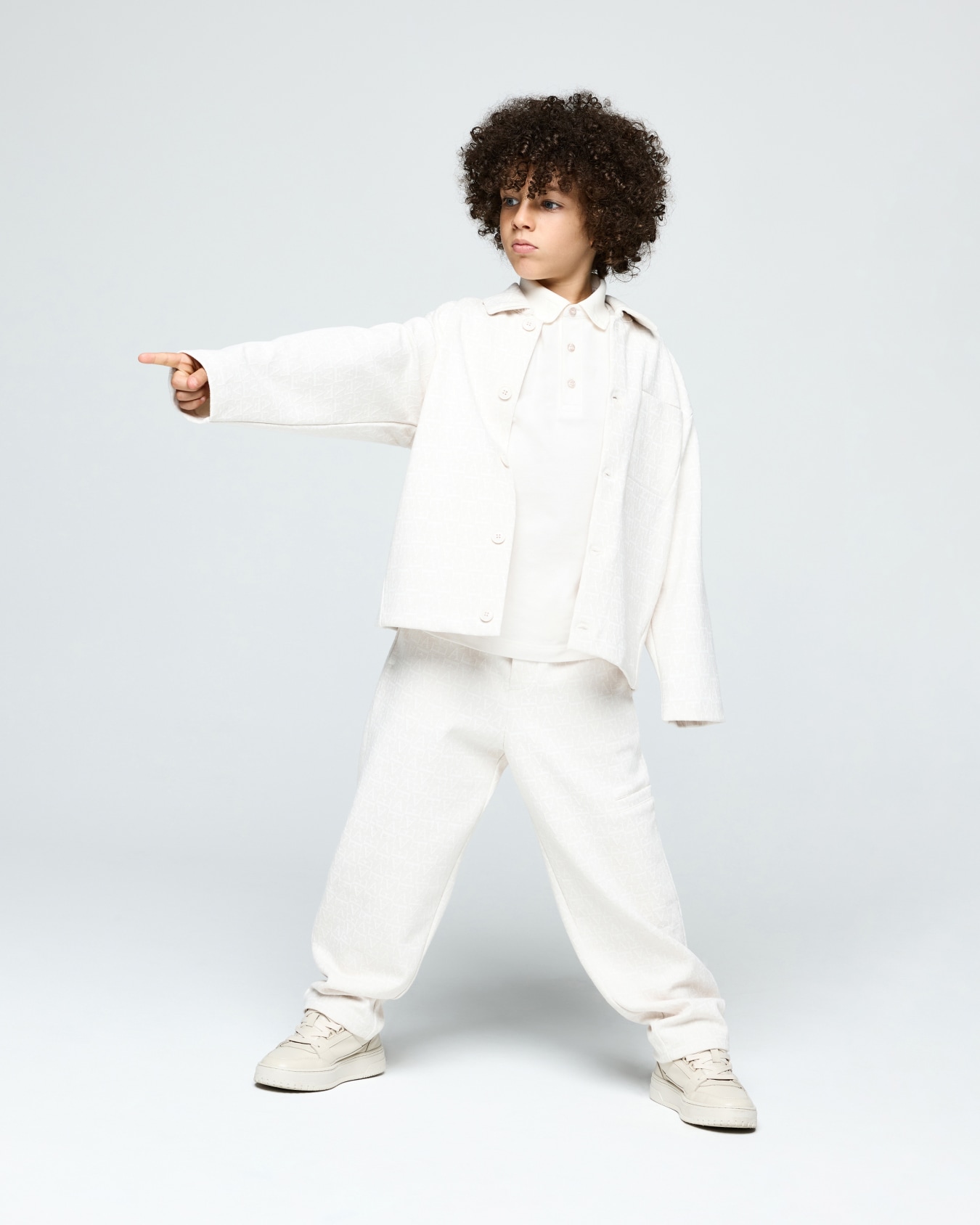Trousers in jacquard double jersey with an elastic waistband Slide 3
