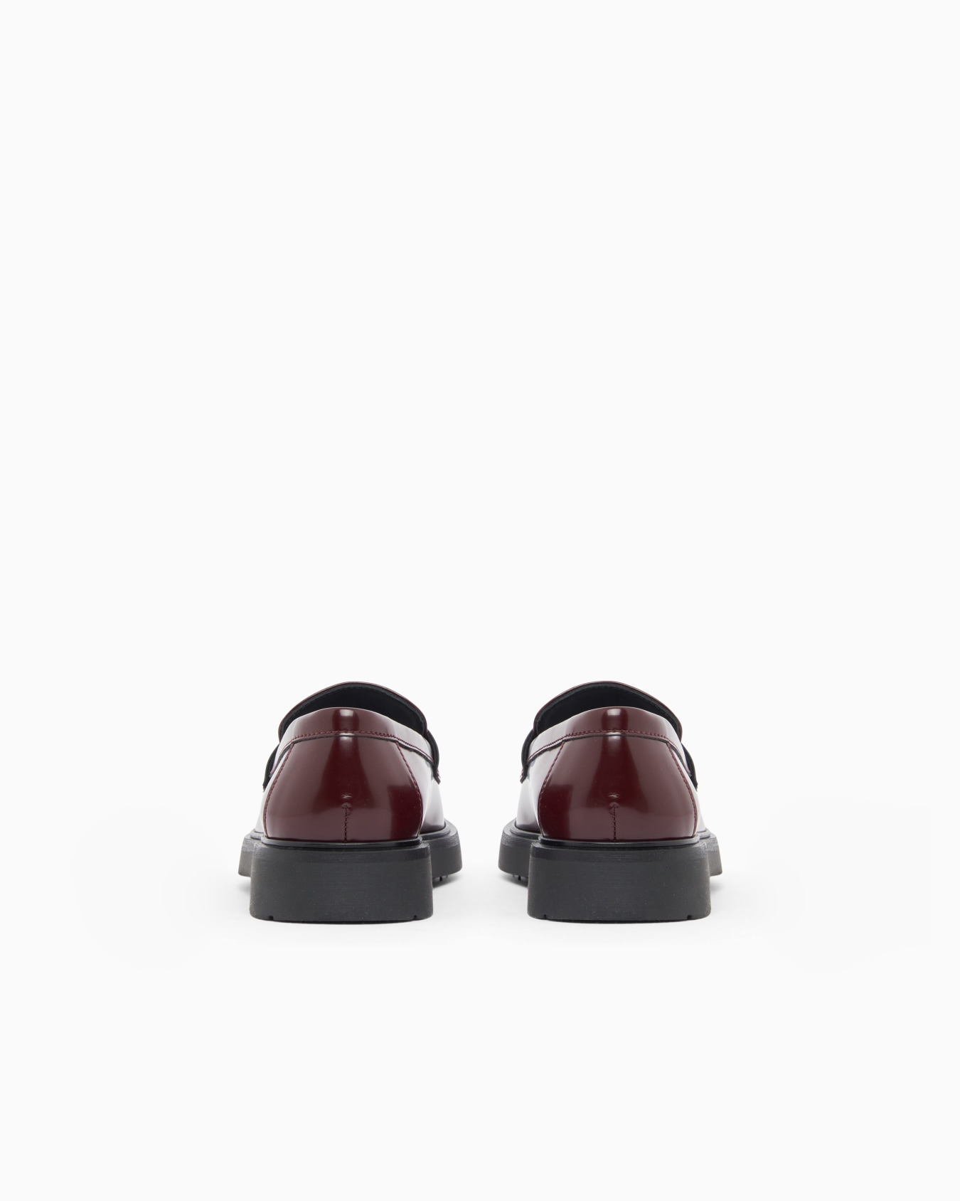 Penny loafers with glossy finish and rubber sole Slide 3