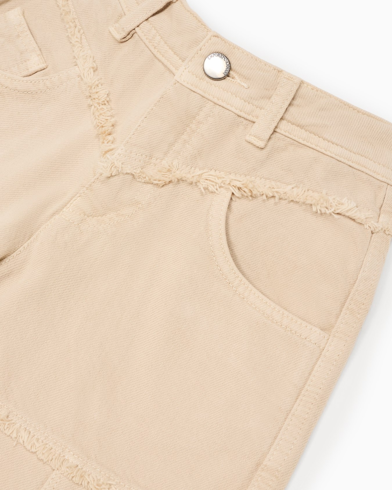 Garment-dyed denim jeans with fringe details Slide 1