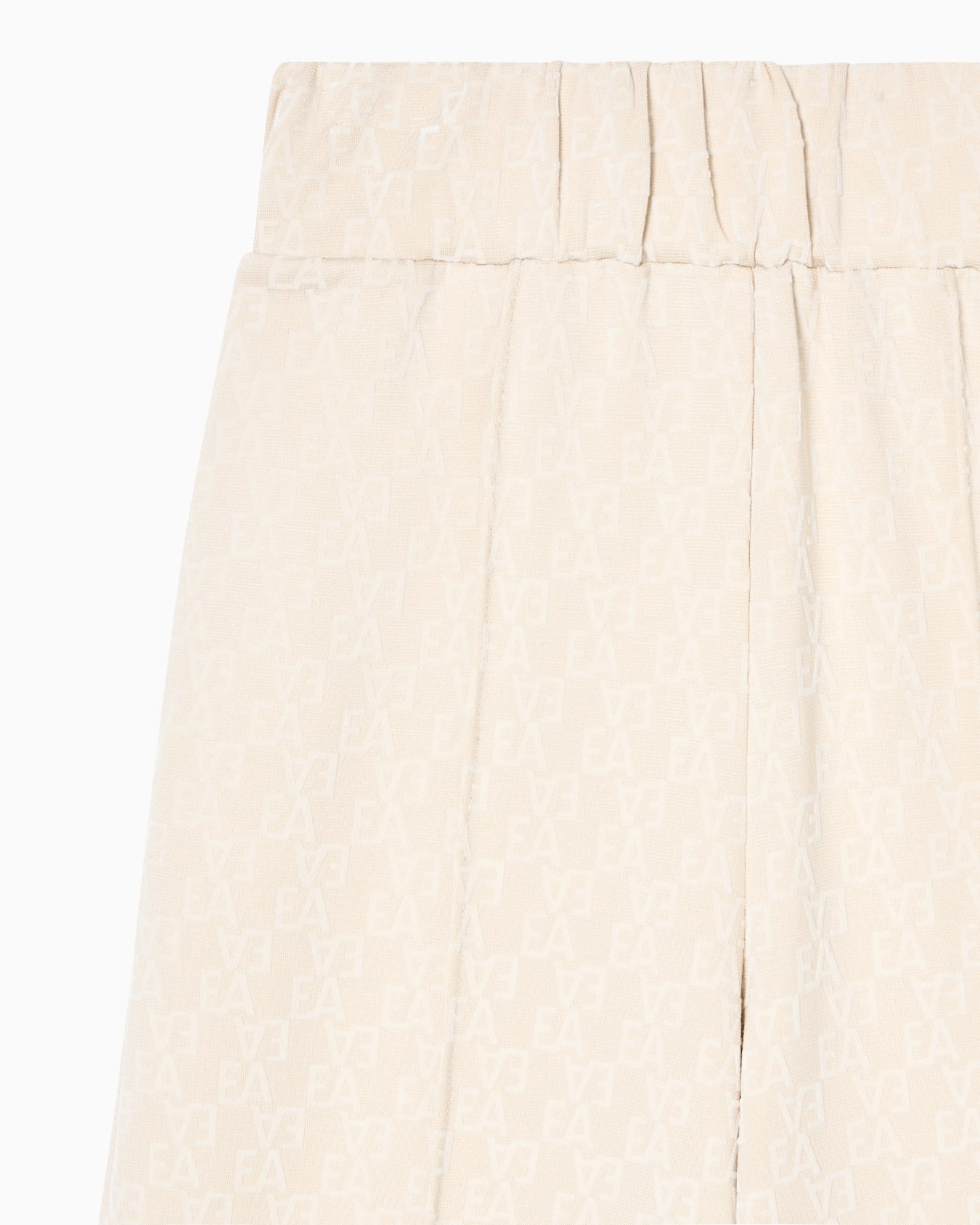 Interlock jersey trousers with all-over flocked EA logo Slide 1