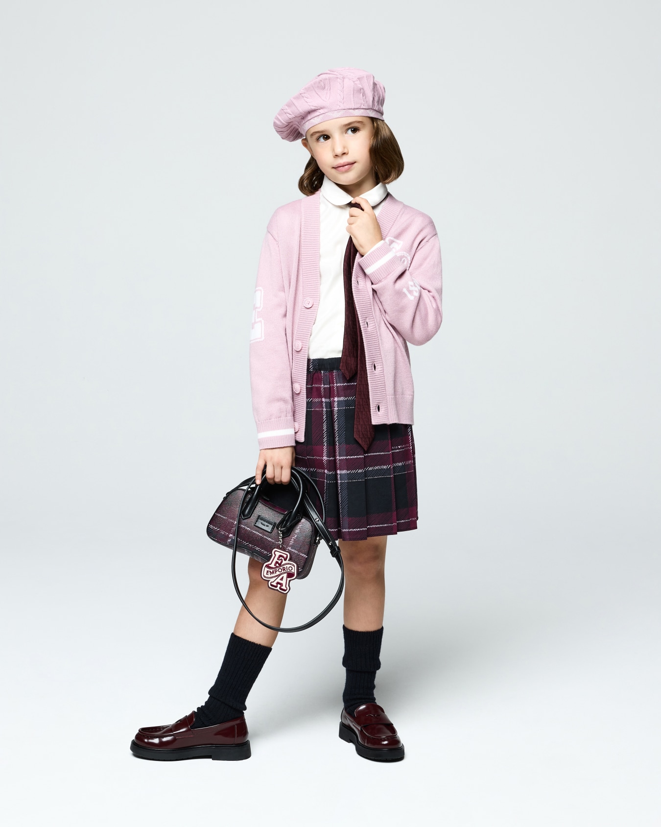 Mid-thigh pleated skirt with a printed tartan pattern Slide 3