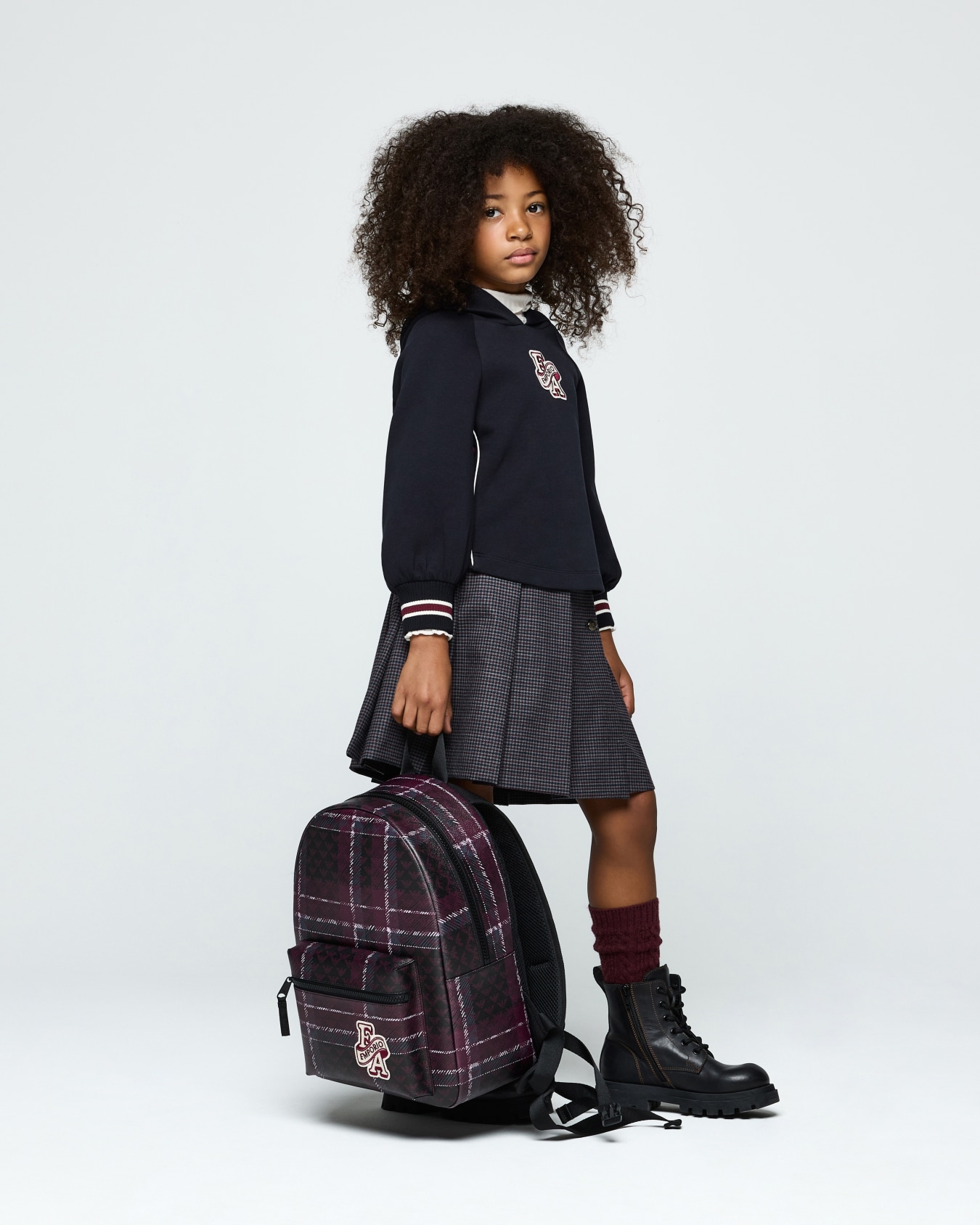 Pleated virgin wool skirt with a side button closure Slide 3