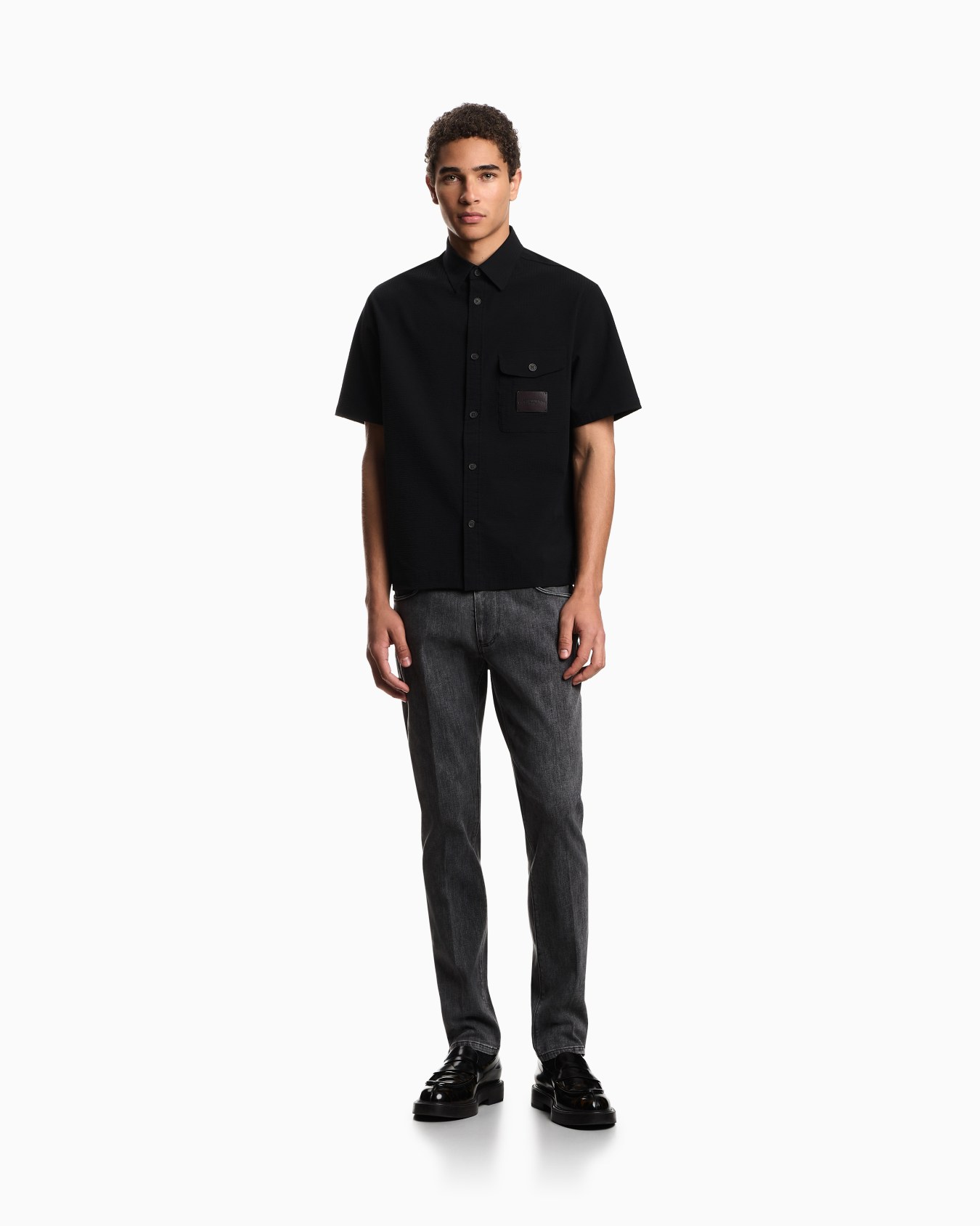 J06 slim-fit, stone-washed stretch-denim jeans Slide 1