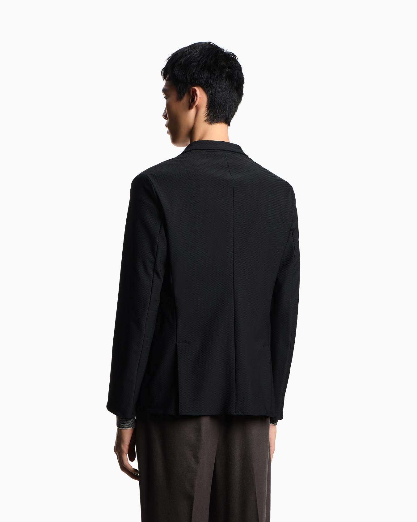 Single-breasted jacket in technical jersey with a 3D micro-textured effect Slide 3