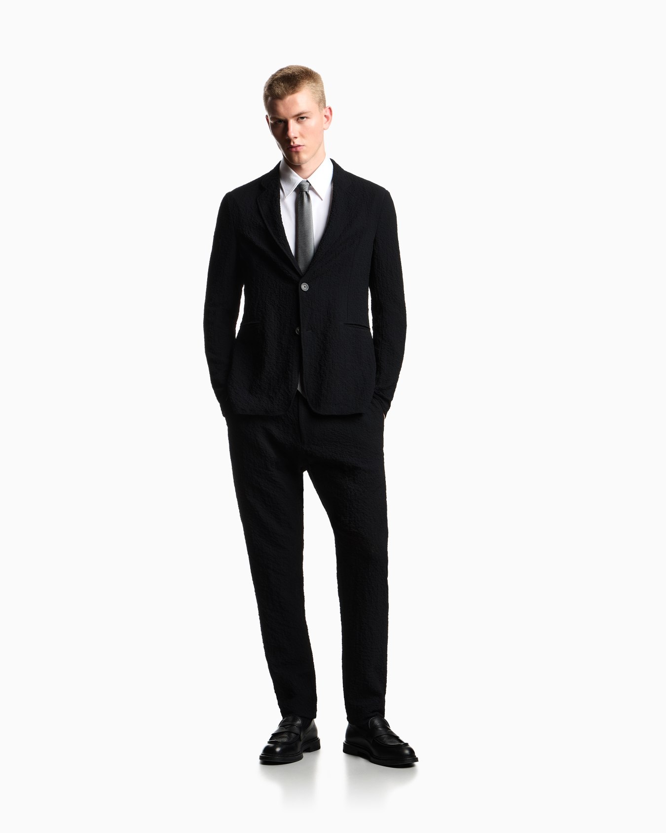 Single-breasted jacket in technical seersucker fabric Slide 1