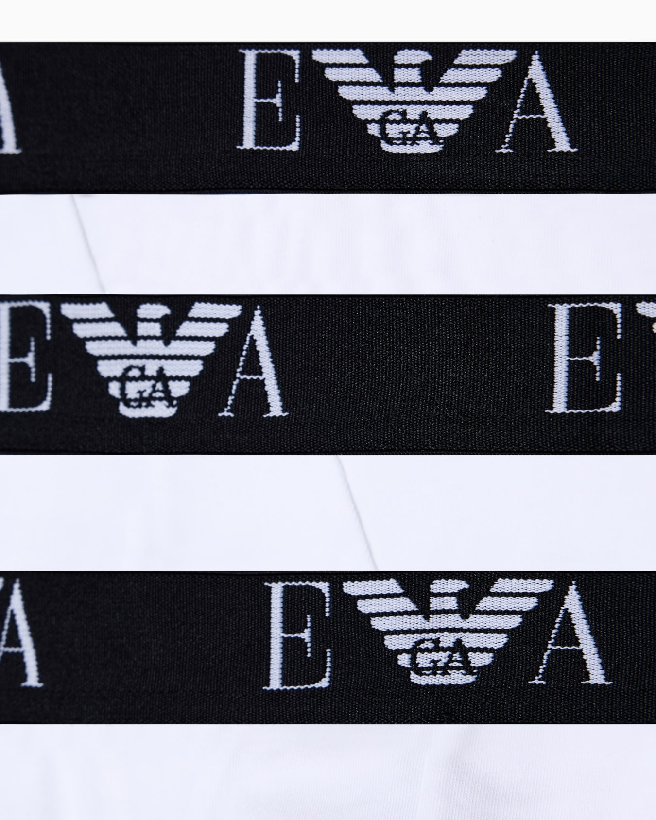 Paquete de tres calzoncillos slip en punto elástico con banda con logotipo EA Diapositiva 3