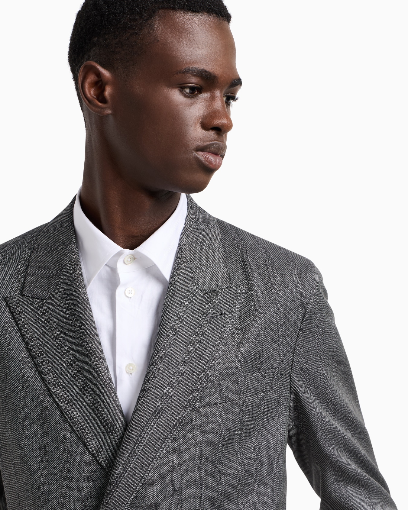 Double-breasted suit in Cheviot-effect armure virgin wool Slide 4