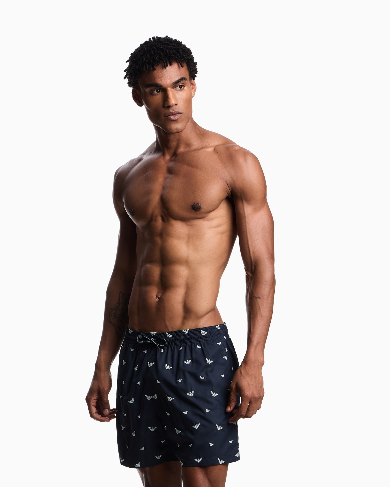 Swim shorts with all-over micro eagle embroidery Slide 1