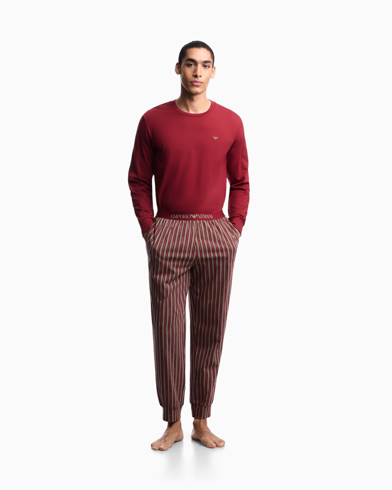 Pajama set in cotton jersey with striped cuffed trousers 슬라이드 1