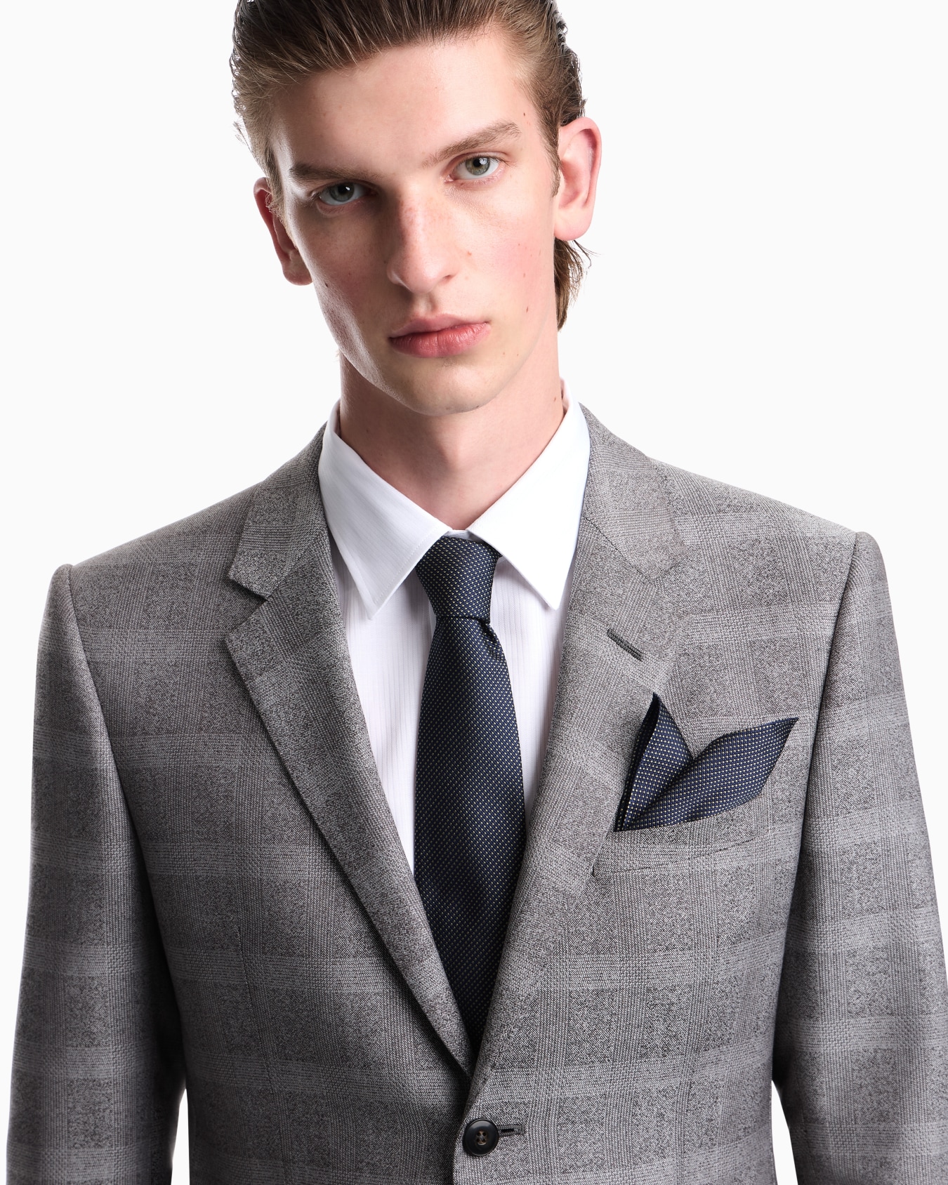Silk tie with a micro-check pattern and smooth texture Slide 2